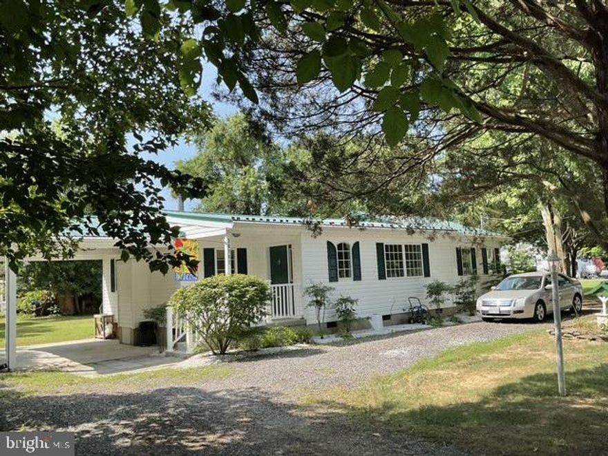 JUST REDUCED!!

This home is located in the tucked-away community of Longview Beach at 36797 Ricardo Drive, Bushwood, Maryland, and is currently priced at $340,000.00. Sitting on 10,500 sf. is just under 1/4 acre.   This recently updated home with great features for winter is the perfect location for the summer.  A new metal roof with lighting rods was installed in 2019, including upgrading installation in the attic/ceiling and exterior walls.  Home features a renovated eat-in kitchen with custom cabinets, a large kitchen counter area for breakfast, and new lighting that opens into the family room. The kitchen has access to the rear yard, and a covered carport or front porch area completes the living space.  

This gem is awaiting a new owner to enjoy all the benefits of just a short a quiet haven for all nature lovers to sip your morning coffee and watch the wildlife that passes by. In the early morning, you can take a walk down less than half a mile to the shoreline for some early morning fishing, drop your boat at the pier, or just enjoy the view of the Potomac River.

The home is located 
From Drive Time 1hour and 42 minutes from Washington, DC
From King George, Virginia, Drive time 45 Minutes
From Annapolis, MD, the Drive time is 1 hour and 48 minutes