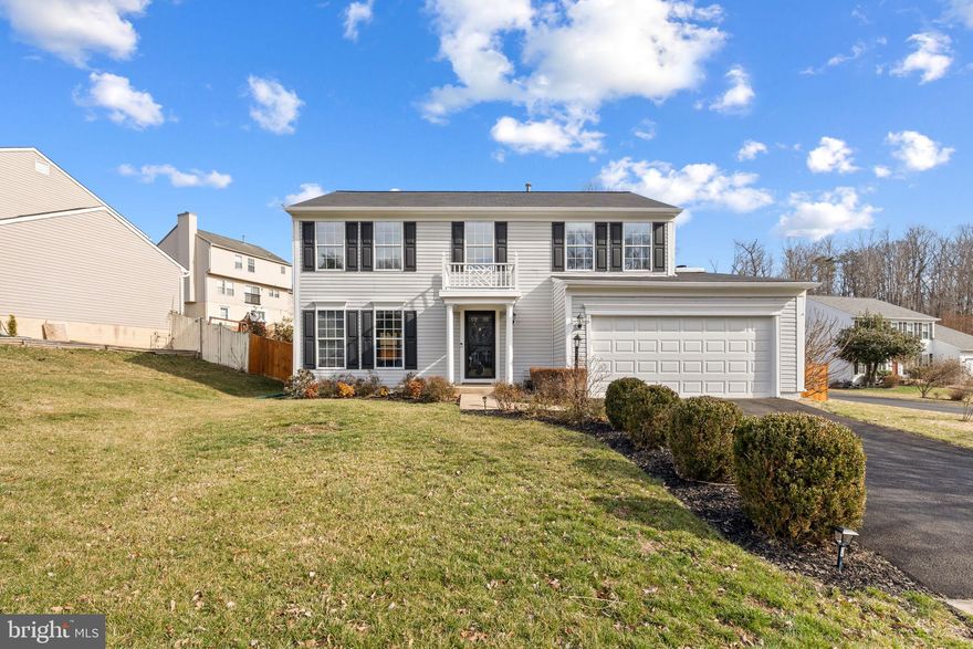 This charming home, located at the end of a quiet cul-de-sac in the desirable Beau Ridge Community, offers spacious living with four bedrooms, three full bathrooms, and a two-car garage. The primary bedroom is a serene retreat, featuring an en suite bathroom with a soaking tub, shower, and a walk-in closet. The three additional bedrooms are generously sized, and the hallway bathroom has been beautifully renovated with modern upgrades. The upper level boasts LVP flooring throughout. 

On the main level, the kitchen is equipped with stainless steel appliances (only five years old), black granite countertops, a marble backsplash, and a pantry with a charming farm door. It also includes an oven with a convection option. The kitchen opens up to a deck and a fully fenced-in backyard, ideal for entertaining or relaxing outdoors. The family room features hardwood floors and a cozy gas fireplace, while the living room and dining room provide ample space for gatherings. The main level also includes a convenient laundry room and a half bathroom. 

The basement offers additional living space with a full bathroom, a recreation room, and a large storage and utility room. Recent upgrades to the home include a French drain system in the backyard, an updated gas fireplace in the living room (2023), a full home plumbing upgrade to PVC piping (2024), and tinted front windows (2024). 

Home is Conveniently situated near Route 1 and I-95, making this perfect for commuters. Multiple shopping, dining and recreation areas nearby to include Potomac Mills Mall, Stonebridge, the Neabsco Boardwalk, and more! Do not miss this opportunity to call this home yours!