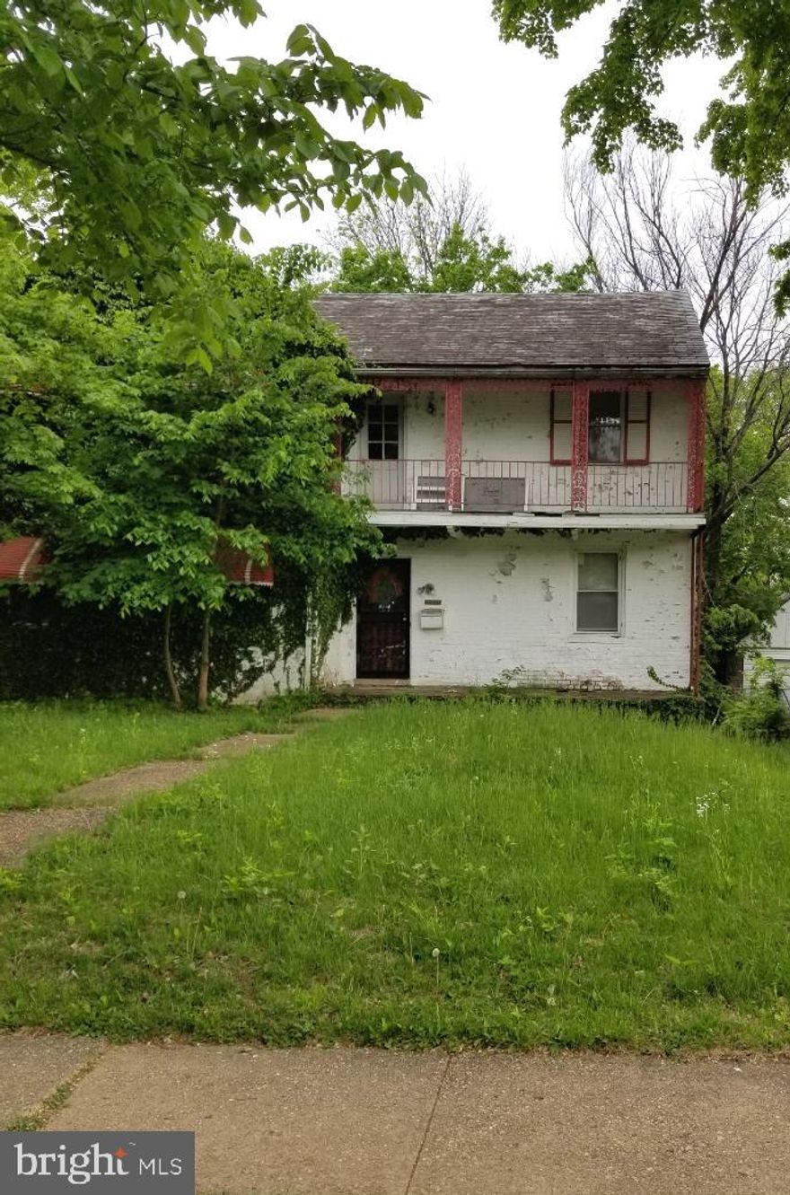 Large charming investment property in Historic Ashburton.3 Decks large front and rear yard with a   2 car attached garage. Hardwood floors throughout. Set up like 2-2bedroom apartments Ground rent will not be redeemed by the seller. As-is