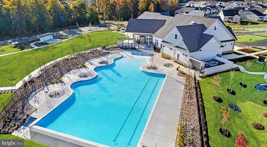 Step into the coziness of this adorable villa style townhome in a community with SO much to offer! This home is less than 3 years old and the community amenities are unmatched including a state of the art clubhouse with an on-site bar, a gorgeous swimming pool for those hot summer days, a fitness center, walking trail, sport courts, dog park, outdoor firepits, all right in your neighborhood! Convenient one level living with two bedrooms including a large primary suite with a walk-in closet, two full bathrooms with tile throughout, separate laundry room, a spacious & open kitchen with stainless steel appliances and a huge island open to the dining area. The living room features a large sliding glass door bringing in plenty of natural light & leads out to your peaceful covered patio perfect for sipping your coffee or wine. There is a one car garage, driveway parking and extra parking spaces available right across from the house. This one is perfect for those looking for a move-in ready low maintenance home with extraordinary amenities. Great central location for commuters! This is a 55+ community but there are exceptions for 45+