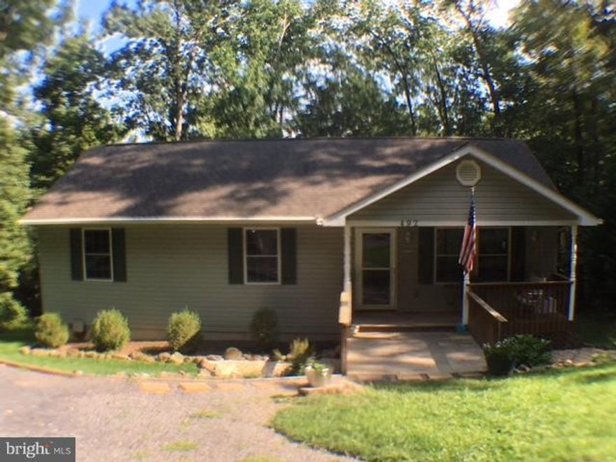 Well maintained 3BR/2BA home on .35 acre in Bryce Resort. Updated kitchen with farm sink, tile backsplash, lots of cabinets. Large open concept kitchen/dinning/living. Laminate flooring in excellent condition, master BR with attached bath, large pantry, pellet stove for additional heating conveys, 12x12 backyard deck.  Minutes from all Bryce Resort amenities.