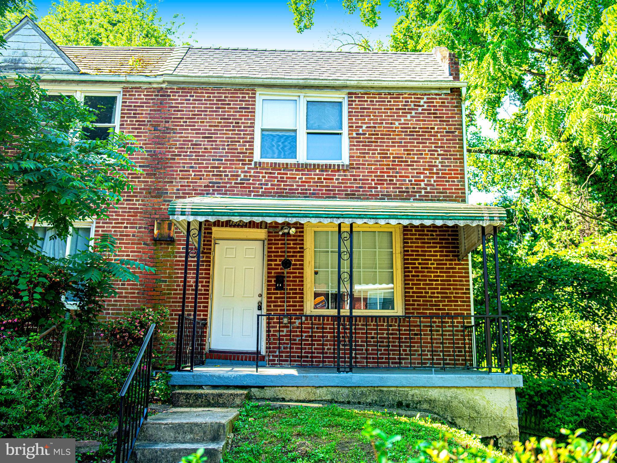 Beautiful end-of-group townhome on a quiet street with no through-traffic. Central A/C. The finished basement features a private entrance offering guests their own living space, complete with their own full bath and kitchenette. Upstairs are 3 full bedrooms. You'll love the covered rear porch that overlooks a wooded lot. New roof 2023. Schedule a tour now!