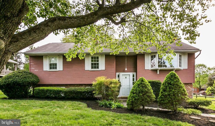 You don't want to miss out on this updated 4 bed, 2 bath single family home in Elkridge! Brand new wood floors and carpet throughout the entire home, as well as fresh paint and updated bathroom! Spacious open living room with large bay window and wood floors that flow into the formal dining room with sliding glass doors to the covered rear deck! Continue to the large kitchen with table space, tons of cabinet and counter space, and access to the deck. Three large bedrooms on the main level, and an updated full hall bath. The lower level has brand new carpet, a brick surround wood burning fireplace, and sliding glass door with access to the rear patio. It also hosts one additional bedroom, and full bathroom. Shed being sold as is. Close to BWI and major highways.