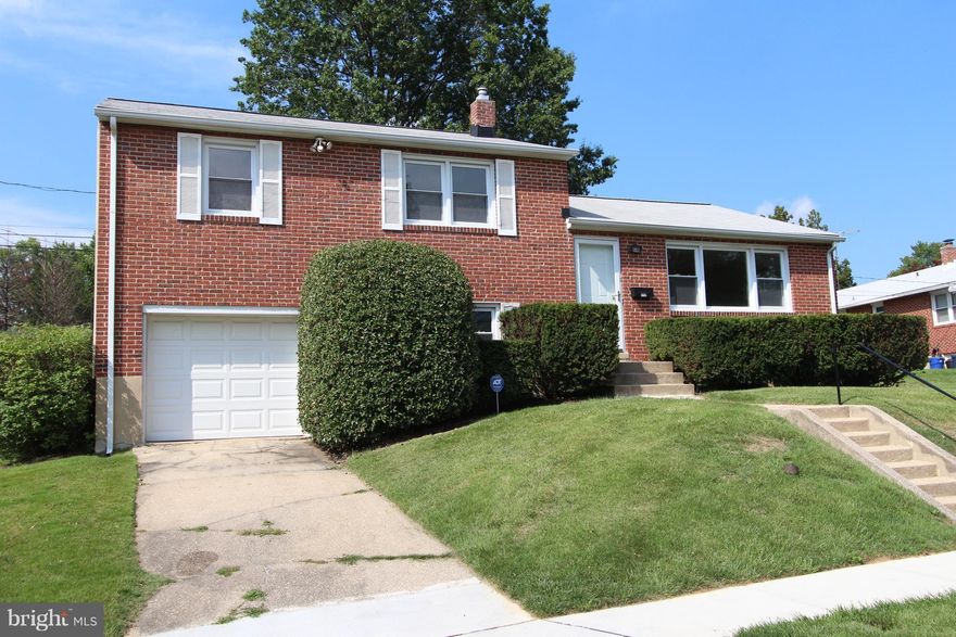 WHAT A GREAT 3 BEDROOM SPLIT JUST A FEW STEPS AWAY ON NEW SIDEWALK FROM HAMPTON ELEMENTARY! FRESHLY PAINTED THRUOUT!  REPLACEMENT WINDOWS! CROWN MOLDING! CHAIR RAIL!  NEWER HVAC!  ROOF IS IN GREAT SHAPE!  HARDWOOD FLOORS! THIS IS A 4 LEVEL SPLIT WITH A FAMILY ROOM, A 1 CAR GARAGE AND A LOWER LEVEL WITH TONS OF POSSIBILITIES!  CLASSIC, LOW MAINTENANCE BRICK!  GREAT BACKYARD FOR SUMMER FUN!