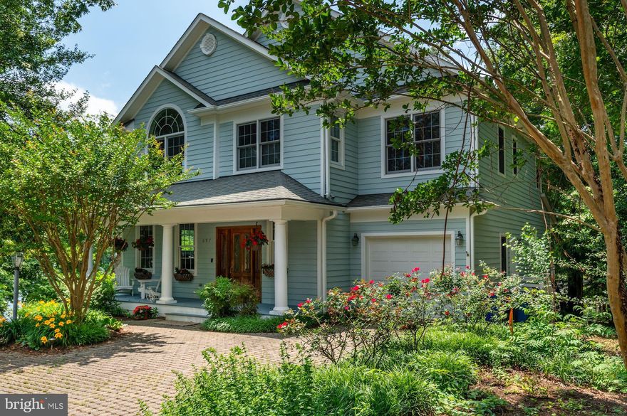 Sited on back Creek with over 200’ of water frontage, this beautiful residence is highlighted by an open sunbathed floor plan and deep-water pier.   The main level features a gourmet eat-in kitchen with breakfast area, a great room with gas fireplace opening to a large rear deck, formal living room with gas fireplace, dining room, powder room, and mud room to garage.  The second level offers a large sunbathed primary bedroom with generous primary bathroom and a walk-in closet.  The second level is completed by a second bedroom with ensuite bathroom, 2 additional bedrooms, a bathroom, and laundry.  The expansive walk-out lower level offers a recreation room, media area, bonus room, full bathroom, and ample storage.  The deep pier offers 5’ MLW and storage shed on the water.  Back Creek offers easy access to Severn River and the Bay.  Eastport and downtown Annapolis are 5 minutes away.