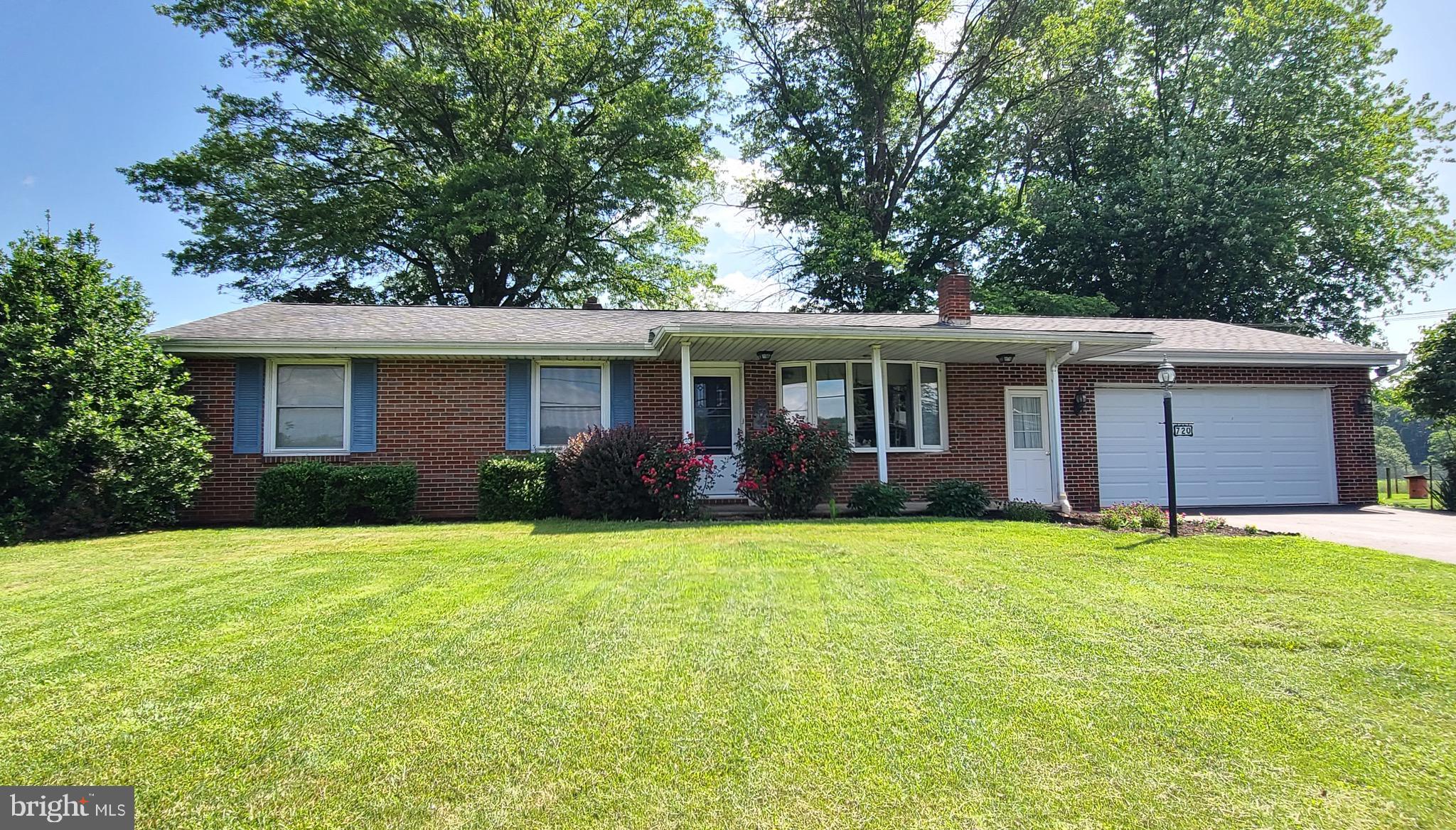 LIVE Auction to be held Thurs., September 18th @ 6:00pm at the Property Address. This Property is Being Sold WITH RESERVE, and the List Price is for Reference ONLY. The Final Sales Price – Contingent Upon Seller Confirmation on Day of Auction – Could be Higher, or Lower, than the ‘Publicized List Price’. All Announcements Day of Sale Take Precedence Over Prior Advertisements. 10% Down Day of Sale. Property Being Sold AS-IS.
REAL ESTATE CONSISTS OF A BRICK RANCHER, BUILT IN 1961, CONTAINING A KITCHEN; DINING AREA; LIVING ROOM; THREE BEDROOMS; AND A FULL BATH ALL ON THE MAIN LEVEL. THERE IS APPROX. 1,092 SQ. FT. OF ONE FLOOR LIVING SPACE WITH HARDWOOD FLOORS THROUGHOUT. THE FULL BASEMENT CONTAINS A FAMILY ROOM W/ BRICK HEARTH & WOODBURNING STOVE; A UTILITY ROOM; LAUNDRY; AND A WORKSHOP/STORAGE AREA. OIL HOT WATER HEAT. CENTRAL AIR. WELL & SEPTIC ONSITE. SITUATED ON A 0.579 (+/-) ACRE LOT, THIS PROPERTY FEATURES AN ATTACHED TWO CAR GARAGE; A METAL-SIDED STORAGE SHED (WITH ROLLUP DOOR); A REAR COVERED PORCH & PATIO; AND A PEACEFUL REAR YARD BORDERED BY FARMLAND. THIS IS A WELL-MAINTAINED PROPERTY, AND A HARD-TO-FIND COUNTRY RANCHER. YOU WON’T WANT TO MISS THIS RARE, AND EXCELLENT, OPPORTUNITY!