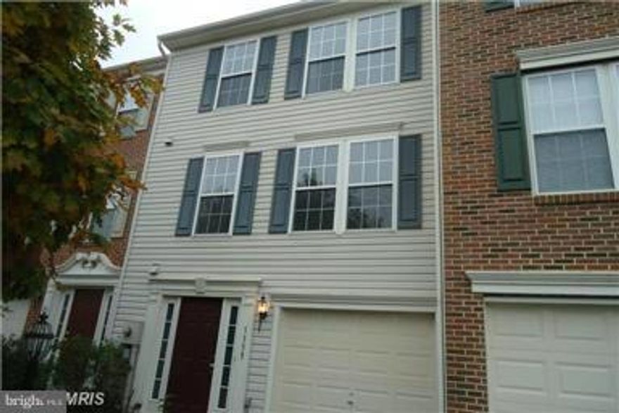 Great location convenient to everything. New Carpet & Paint. New fridge. Move in ready garage TH all three levels finished with sun room extension.