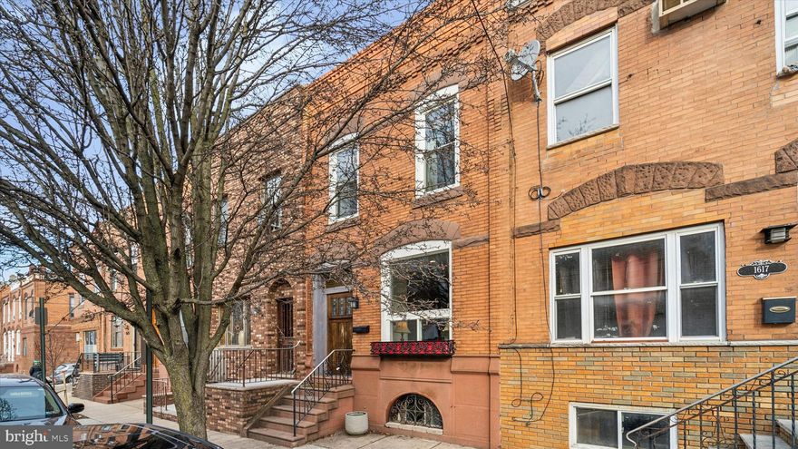 Discover the perfect blend of classic South Philly character and modern style at 1619 Wolf St—now available as a rental! Situated on a quintessential row, this home welcomes you with inviting curb appeal and timeless architectural details. Step through the vestibule into an airy, open-concept layout enhanced by tall ceilings that create an even more spacious feel, seamlessly connecting a generous living area, comfortable dining space, and a contemporary kitchen outfitted with stainless steel appliances and granite countertops. Throughout the first floor, you’ll find gleaming hardwood floors, a newly installed mini-split cooling system, and a convenient half bath.

Step out from the kitchen to relax on the cozy wood-plank patio, ideal for gardening, casual gatherings, or enjoying the afternoon sun. Upstairs, multiple sizable bedrooms await—one features a Jack-and-Jill-style connection to the front room, perfect for a nursery, guest quarters, or a home office. A character-filled lower level provides substantial storage, in-house laundry, and a newly updated heating system.

Positioned in the vibrant Newbold neighborhood, you’re just a short stroll from La Llorona—celebrated for its delicious drinks and Mexican fare—as well as fresh cannolis at Potito’s, savory dishes at Cafe y Chocolate, and local pubs like Second District Brewpub and South Philly Tap Room. You can also find fresh groceries nearby at the South Philly Food Co-Op and Rowhouse Grocery. Don’t miss out on this South Philly gem—schedule your tour of 1619 Wolf St today!