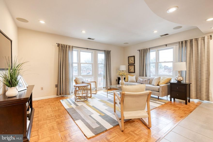 This beautiful, light filled, corner condo in the heart of Baltimore offers the best of city living in the coveted Otterbein neighborhood. Offering 2 bedrooms and 2 full baths with a covered parking space, this residence features beautiful window views with a bright and open layout ideal for both relaxing and entertaining. The kitchen flows into the living area and includes a breakfast bar—great for morning coffee or evening conversation. Meticulously maintained and updated, this home was fully renovated in 2013 and most recently includes a new HVAC system (2022), washer/dryer (2024), and fresh paint throughout (2025). The primary suite has gorgeous park views and includes a walk-in closet and private bath, while the second bedroom with easy access to a full hall bath offers flexibility with a built-in storage and desk area.  A laundry closet with a new washer and dryer adds convenience to this wonderful residence.  Enjoy a dedicated covered parking space, a large private storage unit, and the benefits of a secure elevator building. Residents have access to a shared rooftop terrace with city skyline views—perfect for summer nights, Fourth of July fireworks, or a peaceful moment overlooking the city. Tucked on a quiet, tree-lined block, Waterplace is just minutes from the Inner Harbor, Federal Hill, MARC and Light Rail stations, Camden Yards and M and T Bank Stadium, UMD Medical Center, and more.  Schedule your tour today!