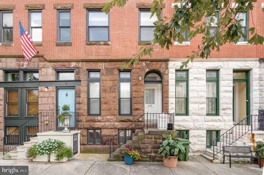 Nestled in the heart of Baltimore's historic Mount Vernon/Mid-Town Belvedere neighborhood, this exquisite home at 205 E Mount Royal Ave offers an exceptional opportunity for those seeking a blend of classic charm and modern convenience. Boasting a prime location, this property is truly a commuter's dream as it sits directly across from Penn Station, making travel in and out of the city a breeze.

One of the standout features of this spacious home is its generous layout, specifically designed to maximize both functionality and aesthetics. As you step inside, you'll immediately notice the open and inviting first-floor layout, which is perfect for hosting gatherings, whether it's a cozy family get-together or a lively soirée with friends. The flow of natural light throughout the home accentuates its warm and welcoming ambiance.

The third-floor master suite is a true sanctuary within this urban oasis. Here, you'll discover a private retreat complete with a charming fireplace, providing the perfect setting for relaxation and tranquility. Additionally, a comfortable sitting area offers an ideal spot to unwind with a good book or enjoy your morning coffee.

With a total of four well-appointed bedrooms and three full bathrooms, this residence offers ample space for family members and guests alike. The three bedrooms on the main level are thoughtfully designed to provide both comfort and privacy.

Throughout the home, you'll find beautiful hardwood floors that not only add elegance but are also easy to maintain. The kitchen is equipped with stainless steel appliances, making meal preparation a joy for any home chef. The exposed brick walls add character and a touch of history, while the upgraded trim, lighting, and tile selections showcase the attention to detail in this property.

Practicality meets luxury with dual-zone HVAC, ensuring year-round comfort, and multiple gas fireplaces that provide both warmth and a touch of charm. Convenience is further enhanced by the upper-level laundry, making daily chores a breeze.

Beyond the comforts of home, the location itself is a major highlight. Living here means being within walking distance of all the wonderful shops, boutiques, and restaurants that Midtown has to offer. Whether you're in the mood for a leisurely stroll through the neighborhood's historic streets or a night out at one of the many dining establishments, this home puts you at the center of it all.

205 E Mount Royal Ave is more than just a house; it's a place where timeless elegance meets modern living. It offers a unique opportunity to experience the best of Baltimore's urban lifestyle while enjoying the comforts of a well-appointed home. Don't miss your chance to make this exceptional property your own.