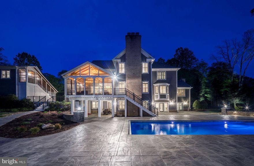 A Stunning Luxury Estate Home in Sought after English Hills Estate, on Private 5 Acres - one of the Best Lots in Fairfax Station. Over 9000 Sq. Ft. of indoor living space and well thought out outdoors for convenience and luxury of daily life at its best. Magnificent newly added Sunroom/Covered Screened- in- Porch with Mahogany Floors, Eze-Breeze Windows bringing the outdoors in. Brand New Heated Swimming Pool, Stamped Concrete Patio, New Azek Deck. Circular Drive decorated with many Cherry Trees and beautiful landscape including extensive lighting.  A GORGEOUS  HOME with privacy at its best and open spaces for indoor and outdoor entertaining. Come, See, Fall in Love and make it your Next Home.