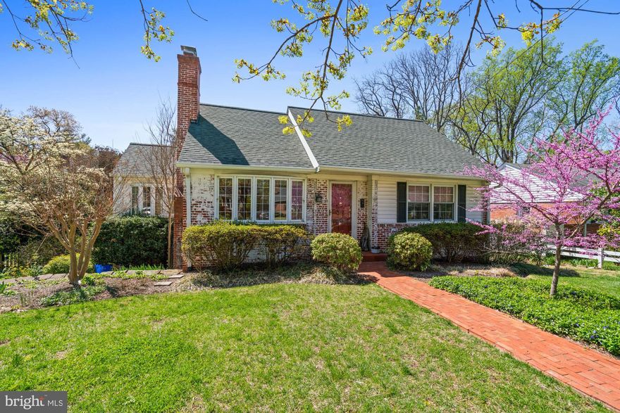 Beautifully sited on a large, verdant lot in the Westhaven neighborhood, this delightful home is brimming with charm – from the front brick walkway to the quaint covered entry, and the stone-accented facade and flowering trees - this property impresses from the moment you arrive. Ideal location close to all of the offerings in Spring Valley (DC), Friendship Heights, the new Westbard Square, and the Capital Crescent Trail.  Picture-perfect with distinctive and thoughtful details, including hardwood flooring, a stunning living room bow window and handsome fireplace, the open-concept family / dining room with soaring wood-beamed cathedral ceilings and glass doors to a spacious deck overlooking a backyard oasis. Wonderful for gatherings, both large and intimate. The backyard is a true highlight - private, lush, fully fenced with mature landscaping, a stone patio, and plenty of room to entertain, garden, play, and unwind. The functional kitchen is adjacent to the dining / family room. Two cheerful main-level bedrooms and a full bath provide additional function and convenience.
Upstairs, two more bedrooms, each with ample closet and storage space, a full hall bath, a linen closet, and attic spaces complete the second floor. 
The walk-out lower level recreation room features built-ins and sliding glass doors to the back patio, and there is an adjoining game room, a bonus room, laundry, and a half-bath. From this prime location, enjoy walkability to Westbrook and Westland schools, parks, trails, and shopping -- with quick access to downtown Bethesda, the Metro, Walter Reed, NIH, and major commuter routes. Welcome home!
