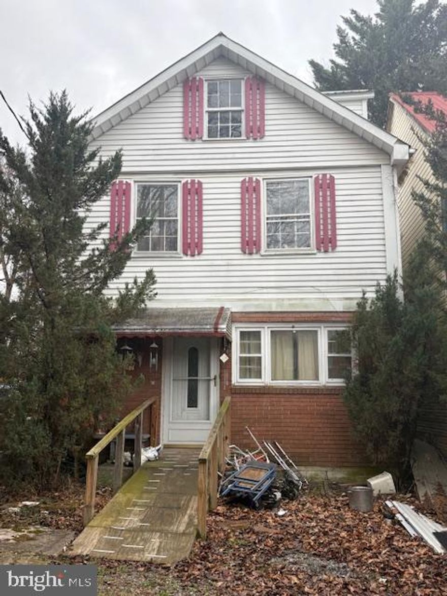 100% FIXER UPPER!!  in a great location minutes from Waynesboro and Hagerstown. Being Sold As-Is!! This home is not currently habitable. The home has good bones but it needs a total remodel. The metal roof appears to be in good shape and does not appear to have any leaks. The home is 3 bedroom and one bathroom with the downstairs entrance level consisting of a living space and kitchen. Steps lead up to the bedrooms and bathroom and the entrance to the rear exists from the second level.  The home is serviced by a Cistern and it does have a good and operable filtration system. The septic tank appears to be in good shape. This home would be a great flip or a fixer upper for a young or small family but it will take some work to get it there.