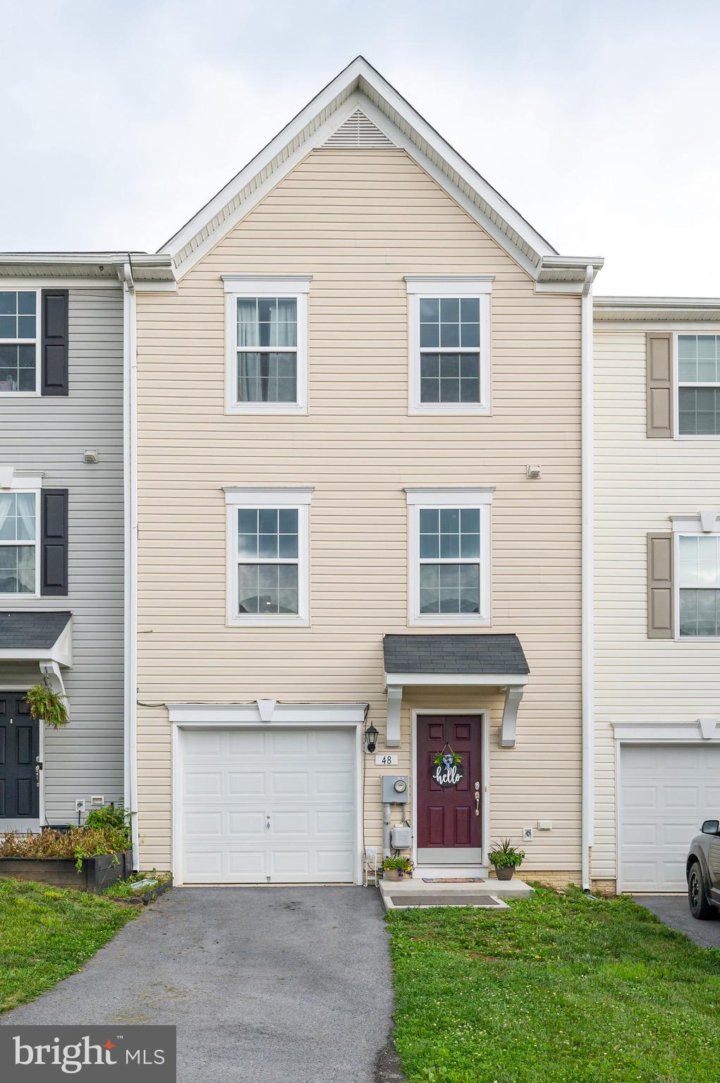 Come see this beautiful, well-maintained colonial style 3 bedroom 2.5 bath townhome near the town of Hedgesville WV. This remarkable home features LVP flooring on the lower level with a flex room, a laundry area (washer and dryer convey), a rough in for additional future powder room. access to the garage and fully fenced rear yard. The main level also features LVP flooring, fresh paint, a spacious kitchen including a kitchen island, pantry and plenty of cabinets with room for dining, a nice family room perfect for entertainment, and with the convenience of a powder room. On the upper level you will find the primary suite featuring a vaulted ceiling, walk-in closet and primary bath that includes a soaking tub, separate shower and double bowl sink. Down the hall you will find your two guests bedrooms and full bath. This home has only had one owner and now it can be yours! Close to Rt 9, schools, shopping and entertainment and lots of great outdoor activities! Welcome to Home Sweet Home!