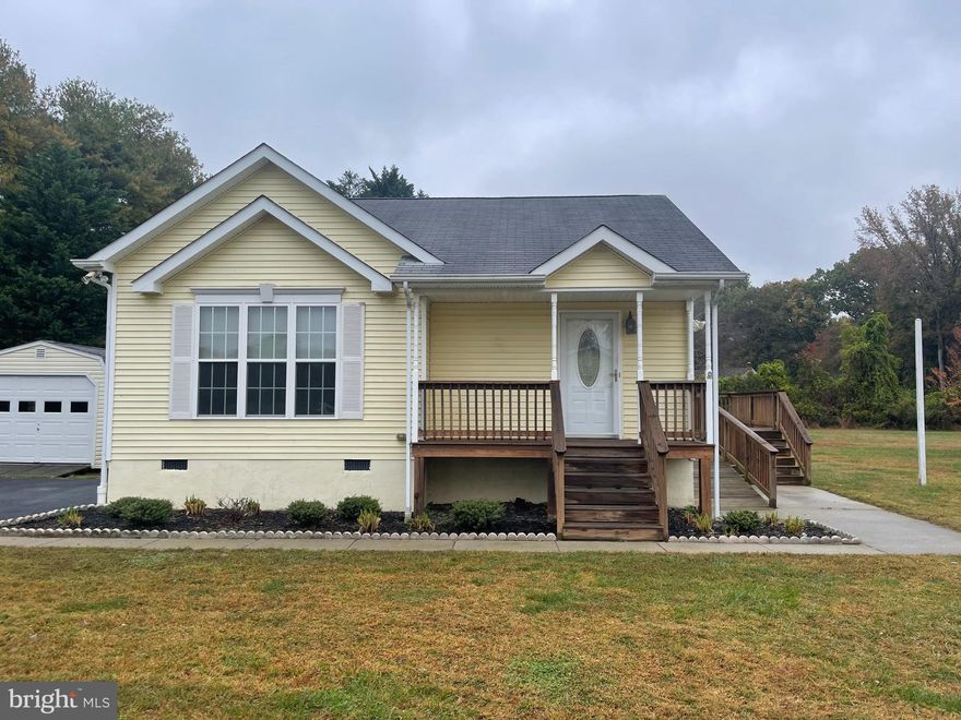 COZY and such a cute two bedroom one bathroom, large tile shower.. fully undated Kitchen with lots of counter space, large Island, and  newer appliances.  Very clean, freshly painted, new flooring.. Cozy deck off the side of the kitchen and it's perfect for your morning coffee... Utilities Included, other then trash service. This cozy home offers so much peace privacy. This is a must see...