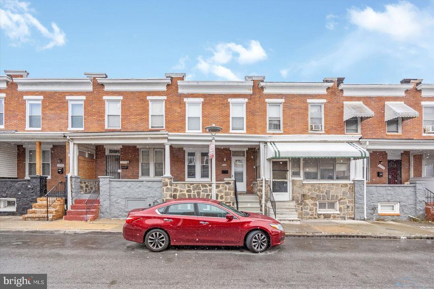 Adorable 2BR/1BA brick Townhome located on a quiet street in Berea-Biddle Street Historic District.  Recently re-listed with a price adjustment! Step up to the stone covered front porch and open the door into your new home.  The main floor offers an open floor plan featuring a luxury flooring, a large living room, open dining room, and updated kitchen.  The kitchen features plenty of cabinets, stainless steel appliances, granite countertops, a deep stainless sink under a window, and a peninsula with breakfast seating for two.  On the second floor are two spacious bedrooms, and a newly updated full bath.  The lower level is unfinished, giving you the opportunity to create the space for your family's needs, and includes laundry and plenty of storage.  From the kitchen step outside to green space and so many possibilities.  This home is move-in ready with so much to offer new homeowners and is located in close proximity to shopping, restaurants, and commuter routes.