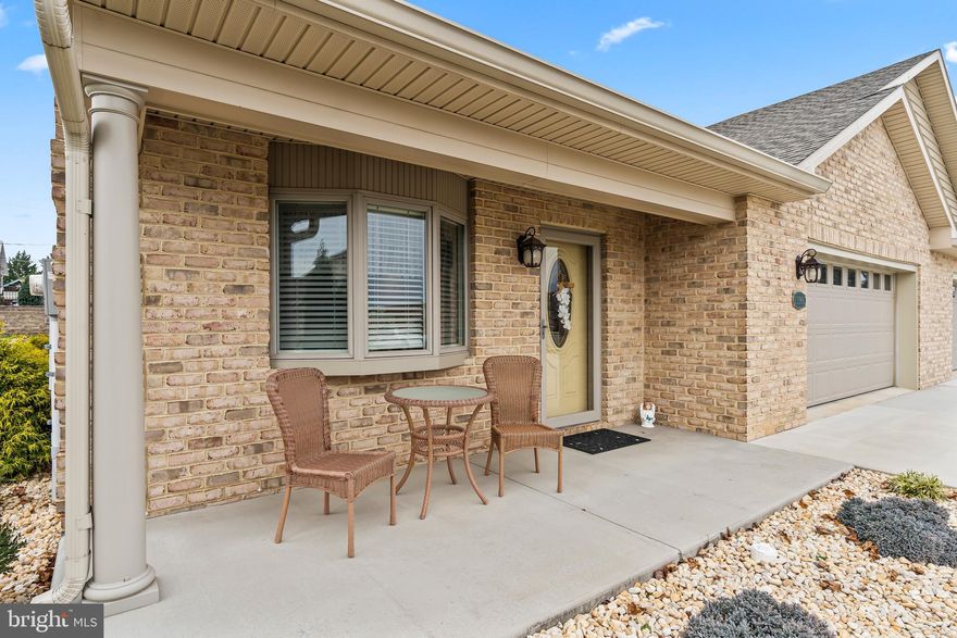 Welcome to 13366 Marquise Drive, a beautifully maintained, nearly-new villa located in the sought-after  Emerald Pointe.   Built in 2021, it combines the benefits of newer construction with the charm and amenities of a well-established 55+ community.  Offering thoughtfully designed space, this property delivers exceptional comfort, modern finishes, and true low-maintenance living.

Enjoy the ease of main-level living, with both bedrooms and both full baths conveniently located on the first floor — including a spacious primary suite that serves as a peaceful retreat. The open main level features a bright living area, generous dining space, and a well-appointed kitchen with sleek finishes and excellent functionality.

Step outside to a lovely covered back porch, perfect for morning coffee, outdoor dining, or simply enjoying quiet evenings while taking in your surroundings.

Upstairs, you'll find an unfinished upper level, offering a fantastic opportunity for future expansion or customizable storage — perfect for adding an office, craft room, or additional living space if desired.

Residents of Emerald Pointe enjoy access to a fantastic community center featuring an indoor saltwater pool, fitness center, gathering spaces, tennis and pickleball courts and more, offering endless opportunities for socializing, wellness, and recreation.  This home is truly move-in ready and designed for comfort, convenience, and the lifestyle you deserve.

Conveniently located near shopping, dining, parks, and major commuter routes — and with the perk of county taxes only — this move-in-ready home is the perfect blend of comfort, community, and low-maintenance living in one of Hagerstown’s premier 55+ communities.