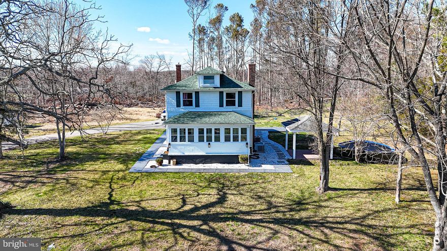 ONE OF A KIND-THIS PROPERTY IS LIKE NO OTHER! Rare development opportunity on 5.55 acres with additional 9 lot building rights, offering immediate value and long term potential. The property includes a renovated 1920 farmhouse with 3 bedrooms and 2.5 baths, ideal for owner occupancy or potential interim rental income. Recent updates include a modernized kitchen with separate pantry, quartz countertops, large center island, new GE appliances, dual zone HVAC, energy efficient improvements with BGE Silver Energy Certification. Completely remodeled bathrooms, Living room with FP, and hickory & pine wood flooring throughout. Outdoor features include a pergola, patio, detached two car garage with workshop, and storage shed. This is a truly unique offering combining usable land for multi-generation living, and future subdivision potential.