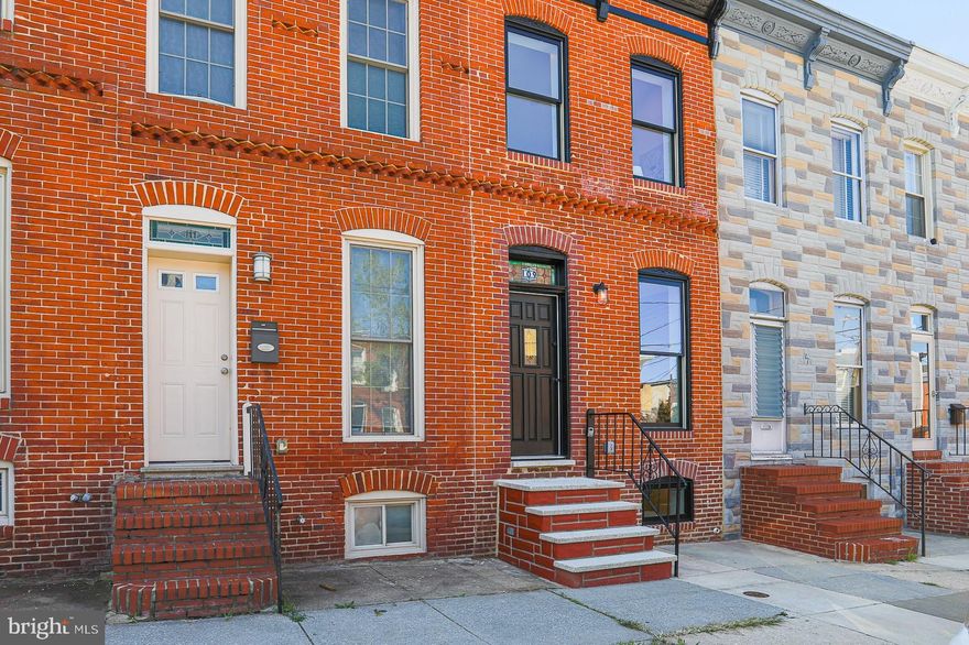 Absolutely stunning, fully renovated home in Riverside.  CHAP approved with the full 10 years remaining, which saves you thousands in property taxes! Steps from Riverside Park and a short distance to all Federal Hill has to offer. This beautiful renovation features 3 bedrooms, 3.5 baths and an open concept first floor. Original charm with modern updates welcomes you to an inviting living room, dining room and a gorgeous kitchen.  The bonus area off the kitchen features a half- bath and space for additional entertaining or family room.  Upstairs you will find a relaxing primary suite with its own bathroom which includes a double vanity and ample closet space.  The light filled second bedroom is charming with a peek of the original brick. Second floor laundry, a linen closet and a second full bathroom top off the second floor.  Head down to the finished lower level which features 7ft ceilings, a private 3rd bedroom or quiet office and yet another full bath with a tub!  Enjoy beautiful views of the city from the rooftop deck and see the lights of Camden Yards and M&T Stadium.  To top it off, you have your own parking pad!  Welcome home!