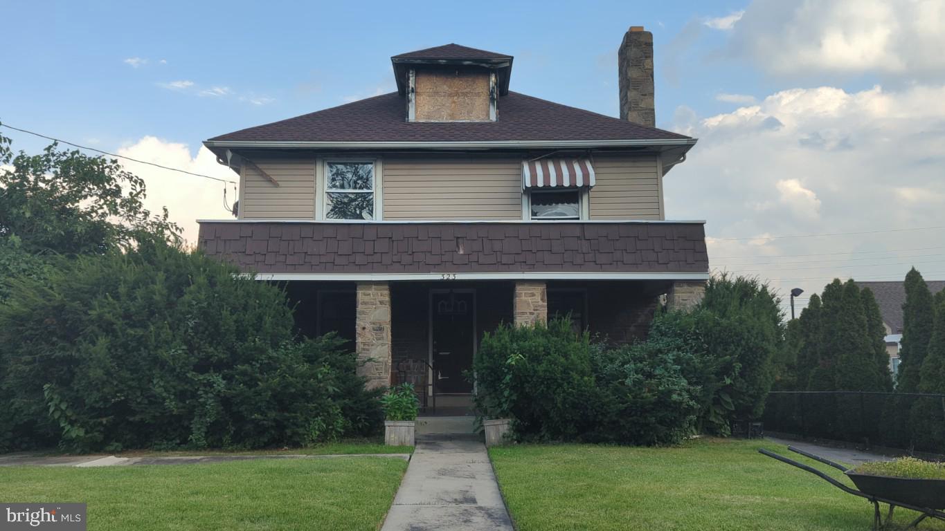Detached Stone Duplex with a bonus unit in the basement and a large detached garage. The two units have separate electric, separate entrances and their own private patios. Home usage can be easily changed into either a single family home or a duplex just by locking or unlocking one door. Perfect property for multi generational families that want to be close but also have their own private space or an investor looking for positive cash flow. Plenty of parking for everyone too. Home needs some work and is being sold AS-IS.