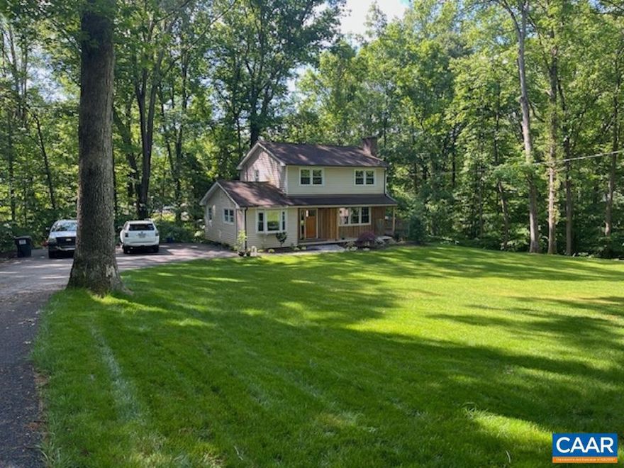 This beautiful three-bedroom, three-bathroom home offers an exceptional downtown location with rare privacy and tranquility. Nestled in a peaceful, tucked-away setting, it provides the perfect escape from the everyday?yet you're just minutes from 5th Street Station and everything Charlottesville has to offer. Quick access to I-64, Covenant School, Biscuit Run Park, ACAC, UVA hospital and the Grounds. Hardwood flooring throughout, first-floor master with full bath?walkout basement with laundry area and storage space.