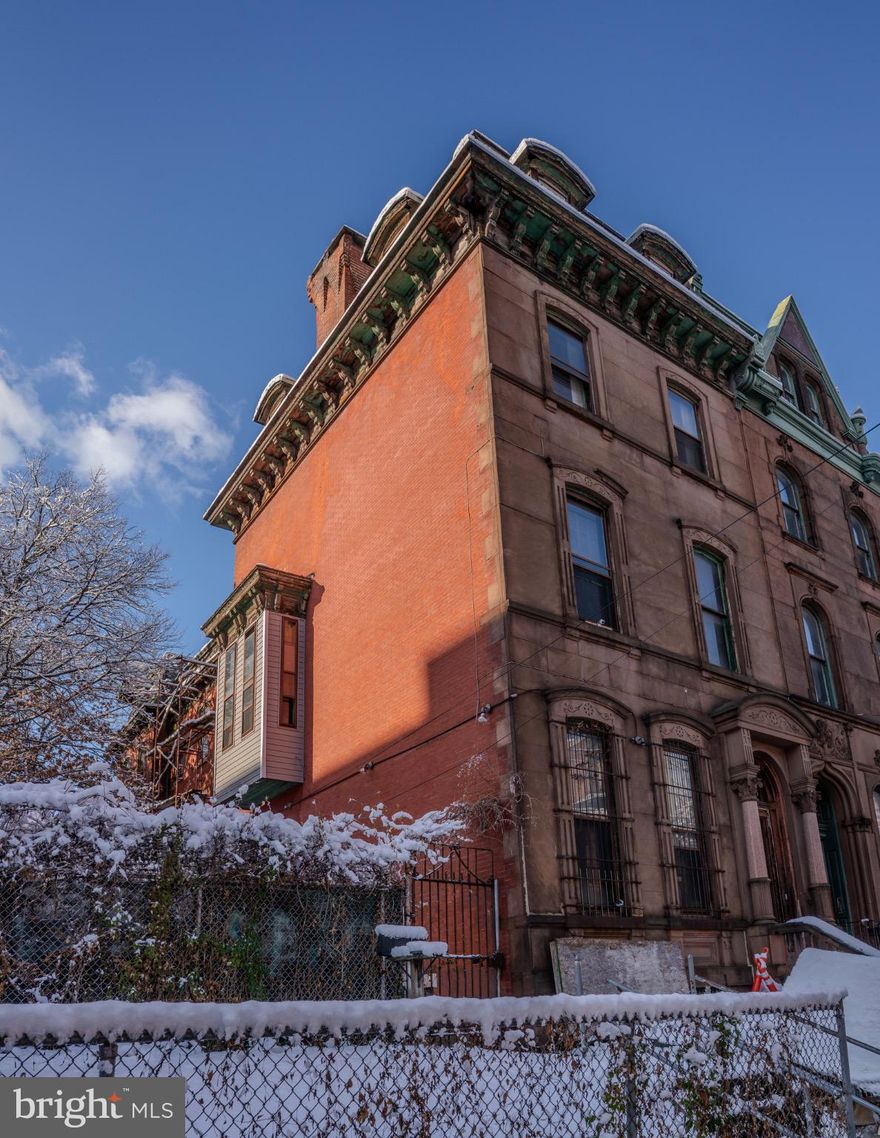 This historic Philadelphia home, listed on the Philadelphia Historic Registry, presents an exceptional opportunity for its next owner to make history. Spanning over 4,000 square feet and occupying just under 0.20 acres of land, this Temple University end unit asset offers remarkable potential.
Restoring this home to its former grandeur or developing the expansive lot into a multi-unit student housing complex are both viable options. The home boasts high ceilings throughout, a spacious backyard, and ample interior living spaces.
The surrounding North Philadelphia neighborhood is undergoing revitalization and provides excellent transit access and close proximity to downtown Philadelphia.