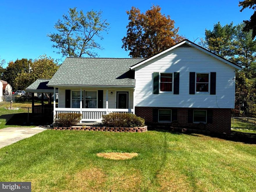 This home is a classic split-level design in a quiet, established neighborhood in Inwood, WV. Perfect for all buyers, including first-time buyers, the layout separates living and sleeping areas while providing plenty of space to grow. The walk-out basement has a large family room and a full bath. Outside, there is a front porch, a side patio, and a fenced backyard.