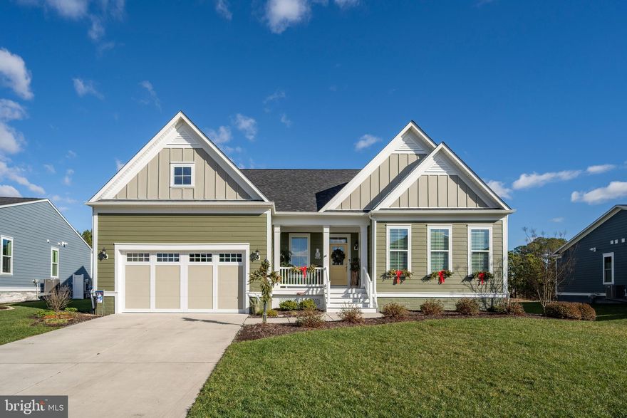 Elevate your lifestyle in this exquisite Coastal Ranch-style home in the Prestigious Glen Riddle Community.  Every detail has been carefully curated for the ultimate living experience. Nestled on an elevated lot with captivating pond views, this home boasts a private backyard oasis, complemented by James Hardie Plank siding for enduring charm. 
Experience the epitome of modern living in this stunning residence, where an inviting open floor plan seamlessly blends style, functionality, and sophistication. The heart of this home is the chef’s dream kitchen, a space that caters to both culinary enthusiasts and those who appreciate the beauty of exceptional design. This upgraded chef's kitchen is a culinary masterpiece with quartz counters, a 5-burner Gas Gourmet Stove, elegant subway backsplash and a large center island for entertaining.
Discover the extra-large sunroom boasting a custom wood-burning fireplace, floating shelves, and shiplap accents with large windows for natural lighting. Entertain in style with an additional touch of sophistication from the elegant custom wet bar with a separate ice machine.
Every detail is meticulously crafted, including ceiling fans in all bedrooms and a large Bonus/Flex room that has the potential to be an office, den or extra bedroom/ sleep space.  The spacious laundry room featuring ceramic tile and a utility tub. 
The primary suite is a retreat within a retreat, offering custom rear access to the deck and hot tub, complemented by a gorgeous custom closet featuring built-in cabinets, drawers and shelves. The large primary bathroom is a lavish escape with an upgraded frameless shower, a large soaking tub, and granite counters.
Step Outside onto the custom-built Composite Trex deck and relax under two large retractable awnings or in the spacious 6-person hot tub.  This beautiful home with lovely pond views, sits on a critical area lot.
So many upgraded features in this home like a climate-controlled basement crawl space for extra storage and Two car garage with bonus storage space.
Live in luxury, surrounded by thoughtful upgrades and attention to detail. Seize the opportunity to make this dream home yours – a true sanctuary in the heart Glen Riddle Community in West Ocean City.