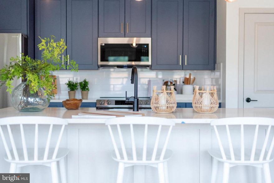 Welcome to the thoughtfully designed Telluride floorplan, a one-level end-unit luxury condo located on the second floor of a four-story building in the desirable Gambrill Glenn community.

This open-concept layout features a spacious family room, a dining area with a cozy fireplace, and a gourmet kitchen that flows together perfectly for both entertaining and everyday living. A covered terrace at the center of the home brings in natural light and extends your living space outdoors.

The three-bedroom layout includes a luxurious primary suite with a spa-inspired bath and a large walk-in closet. A second full bathroom and a dedicated laundry room offer added comfort and convenience. This Telluride showcases the unique Topanga interior package, featuring soft-close blue shaker cabinets, an oversized farmhouse apron kitchen sink, white quartz countertops, upgraded stainless steel appliances, a subway tile backsplash, and matt black finishes throughout.

Experience low-maintenance condo living without sacrificing style or functionality. Community amenities coming soon include walking paths, a picnic area, and outdoor recreational spaces. With quick access to I-70, I-270, and Route 15, you are just minutes from the shopping, dining, and parks of downtown Frederick.

The builder is offering $30,000 in incentives with the use of the preferred lender and title company, which has already been reflected in the sales price. 

Don't miss this opportunity to purchase  a home in one of Frederick’s most convenient new communities. Visit the sales office Friday through Monday from 12 to 5:30 PM, or reach out for more information.