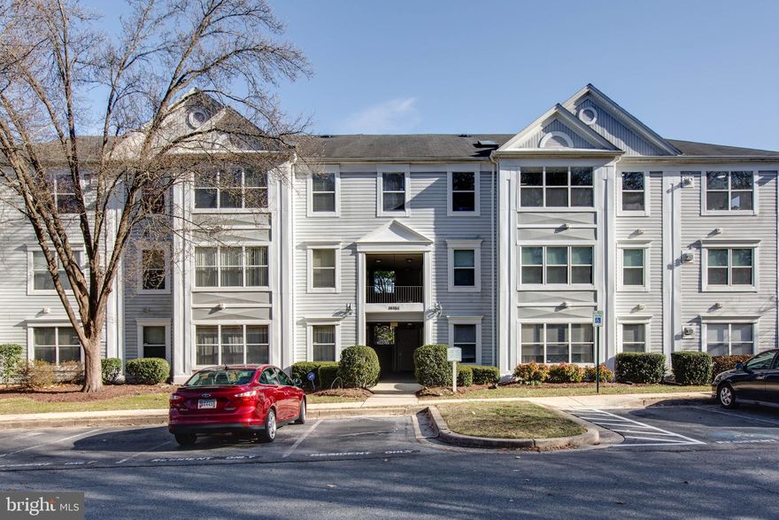 Welcome to 14101 Fall Acre Ct! Located in the highly sought-after Wintergate at Longmead Crossing, this bright and spacious top-floor 2-bedroom, 2-bathroom home is filled with natural light. The living room features vaulted cathedral ceilings and a skylight, creating an open and airy atmosphere. Enjoy an updated kitchen with hardwood floors, an in-unit washer/dryer, and ample storage throughout. This vibrant community offers two pools, tennis courts, a tot lot playground, and a community center, all set within a quiet building and serene, park-like setting. Conveniently located near major commuter routes, ICC, Glenmont Metro, shopping, and dining, this home provides both comfort and accessibility. Don't miss this incredible opportunity—schedule your showing today! Upgrade: Fresh Paint, New Light fixture