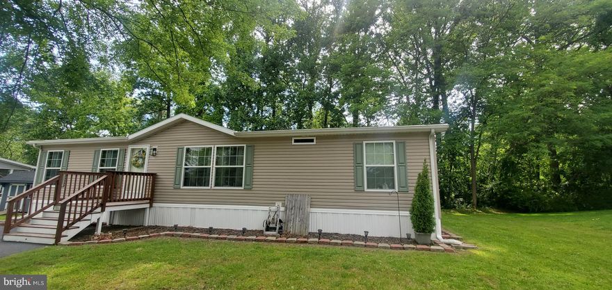 Welcome to 22 Leona drive in Maybelle Manor.  This three bed two bath how is in like new condition.  Fantastic open concept style mobile home that will impress you with the square footage and lay out.  You will see as you enter the home how well this has been cared for pictures do not do it justice!  All bedrooms have walk in closets.  Primary bedroom is very large and has its own large bathroom.  The other bedrooms are close to the hallway bath room.  Built in 2014 this is a one owner home.  Price to sell, more pictures to come and open house will be Saturday June 7th from 1pm to 3pm.  Lot rent is $670.00, buyer to verify with park and must be park approved to purchase.