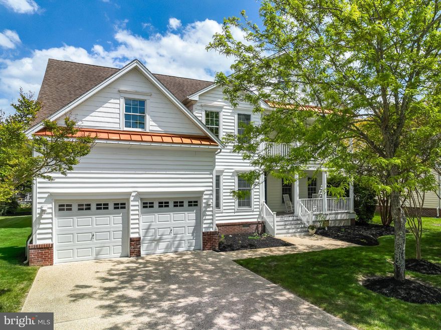 Welcome to this bright and beautifully updated home in Bethany Lakes, a gated Toll Brothers community just two miles from Bethany Beach. Enjoy the best of coastal living with the Fresh Pond Trail system only one mile away—perfect for walking, running, or biking—and grocery shopping and local restaurants conveniently nearby.

Inside, the home offers a light-filled interior with thoughtful upgrades throughout. The renovated kitchen features stainless steel appliances including a GE Profile double oven, Samsung refrigerator, and Bertazzoni induction cooktop. Hardwood flooring was installed throughout the first floor in 2023.

The impressive great room showcases soaring ceilings and flows seamlessly into formal living and dining spaces—ideal for both everyday living and entertaining. The spacious primary suite offers private outdoor access and a well-appointed bath with separate vanities, soaking tub, and tiled shower.

A finished bonus space off one of the four bedrooms provides additional sleeping or flexible living space. Recent improvements include two Trane heat pumps, a new deck for outdoor enjoyment, and an EV charger in the garage.

Residents of Bethany Lakes enjoy exceptional amenities including a saltwater pool, tennis and pickleball courts, clubhouse, fitness center, playground, and pond fishing in this beautifully maintained and active community.