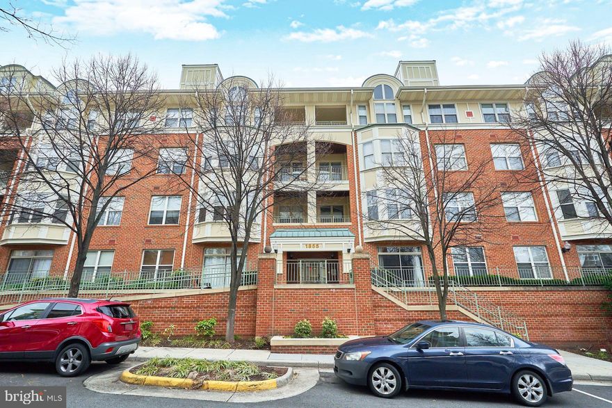 Price reduced from $550,000 to $524,900!!  It doesn't get any better than this...Stratford Park was the first luxury condominium at Reston Town Center.  Walk to Reston Town Center, the new RTC metro station, walk to Lake Anne. This sought-after end unit with walls of windows has everything today's buyer wants and is the largest floor plan all on one level.  Living room with GAS fireplace opens to outdoor deck/patio.  Large dining room with bay window.  Two bedrooms each with separate baths. Reston Town Center is home to metro, shops, restaurants, movies, concerts and more - and the crown jewel of Reston and Northern Virginia.  Minutes to Washington Dulles airport. Prime garage space plus tons of free surface parking for guests and visitors.  Additional storage unit in the garage.  On-site community center, business center, fitness facility and seasonal pool.  Super location for bikers/walkers/runners with direct access to the W&OD Hike and Bike trail!