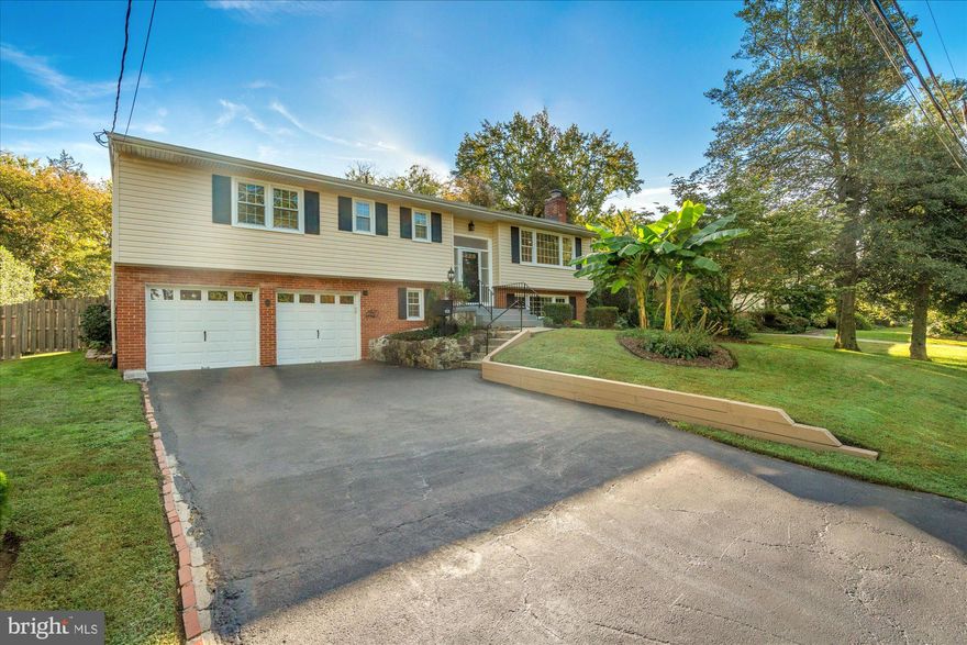 Discover the perfect blend of mid-century charm and modern amenities in this sun-drenched home nestled on a private, increasingly scarce, nearly half-acre lot in the highly coveted Riverside Estates neighborhood of George Washington’s Mount Vernon. This expansive 5-bedroom, 3-bathroom residence offers the ultimate indoor-outdoor living experience. Kick back and unwind on the expansive deck that overlooks your large fenced-in yard, the perimeter of which is surrounded by remarkably lush, mature landscaping, creating a regular outdoor oasis ideal for gatherings, play, or solo relaxation. The interior of the home has been thoughtfully updated and lovingly cared for, exuding an overwhelming sense of warmth and character. Upon entering, you'll be greeted by a bright and welcoming living room abundant with natural light, an intimate dining area, and newly refinished gleaming hardwood floors throughout. On the main level you’ll also find four well apportioned bedrooms (with brand new carpeting) and two bathrooms, inclusive of the primary suite (with en-suite bathroom) as well as the radiant kitchen which sparkles of quartz countertops and stainless-steel appliances. The fully finished lower level, also showcasing fresh new carpeting, provides substantial additional living space, offering a sprawling Rec Room, laundry room and an additional bedroom and hall bathroom. Other notable upgrades include recent roof replacement (2019 with 50yr warranty), brand new HVAC system, newly resealed driveway and garage (2025). Residents of Riverside Estates enjoy easy access to parks, trails, shopping, dining, and everything else Northern Virginia has to offer. This home is conveniently walking distance to neighborhood schools (most notably top ranked Riverside Elementary), the GW Parkway Trailhead, Mount Vernon Estate, GW Rec Center, public transportation and is just a short drive away from the quaint shops and restaurants of Old Town Alexandria! So, whether you’re looking to join a social club (pool, yacht or country), the local rec center or just grab a bike and go for a 10-mile ride down The Parkway, this home offers something for everyone. Come join the exclusive Riverside Estates community where resort style living meets small-town charm - but act fast, opportunities like this are increasingly rare, schedule your showing today!