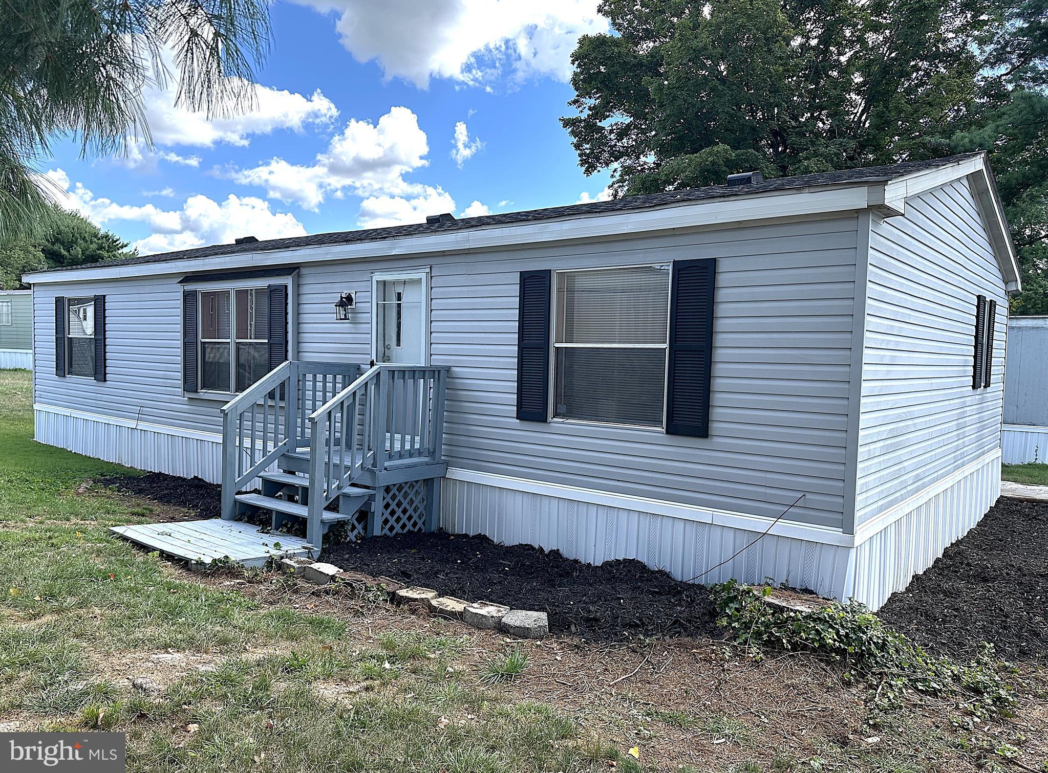 Nicely Renovated Double Wide in Sought After Lakeside Village Mobile Home Community! Over 1400 Square Feet of Finished Living Space with Updates Including New Architectual Shingle Roof, New HVAC System, New Waterproof Pergo Flooring Throughout Main Area, Kitchen and Bathrooms, Freshly Painted Kitchen Cabinets with New Hardware, Updated Stainless Steel Appliances in Kitchen, New Skylight, New Light Fixtures, New Ceiling Fan and New Paint Throughout. Inside Features Large Living Room, Separate Formal Dining Room, Big Primary Bedroom with Private Bathroom, New Garden Soaking Tub and Walkin Closet. Outside is Nicely Landscaped with a Front and Back Porch, Paver Walkways and a Paver Patio Perfect for Grilling. Community Perks Include a Swimming Pool, Fitness Center and Community Club Room Available to Rent for Family Functions or Parties. Easy Access to 71 and 70. Close to Shopping, Restaurants and Downtown. Don't Delay, this one won't Last!