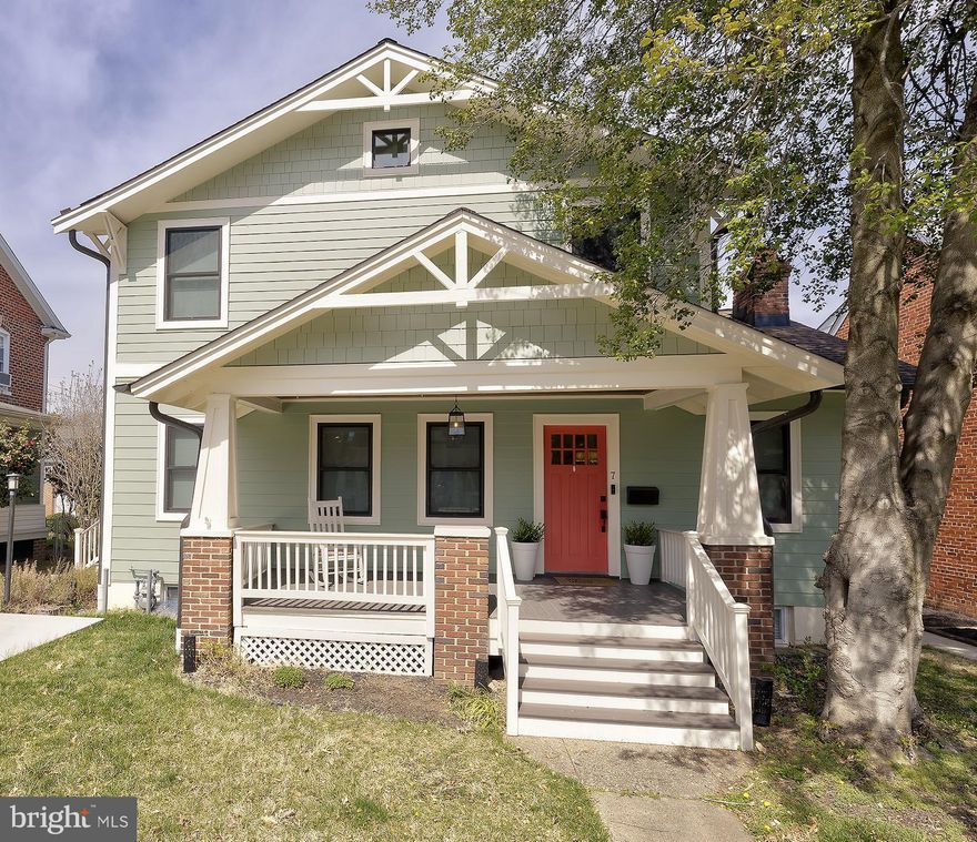 Beautifully renovated and elegantly expanded in 2019, this Craftsman gem in the coveted Rosemont neighborhood offers it all!  The inviting front porch sets the tone — an ideal spot to unwind with your morning coffee or catch up with neighbors. Inside discover a welcoming living room featuring a wood-burning fireplace. The flow continues seamlessly into the formal dining room, perfect for hosting memorable dinner parties.  Enjoy ample natural light with new, double paned wood windows and beautiful hardwood floors throughout.
At the heart of the home, the gourmet kitchen is a showstopper. With elegant royal blue and white shaker cabinetry, high-end appliances, a generous farmhouse sink, and an additional beverage sink, this space is as functional as it is beautiful. The oversized island anchors the room, making entertaining effortless with extra space for a breakfast table. A chic bar area, a well-appointed half bath, an adorable and practical mudroom with ceramic tile and ample storage complete this level.
Upstairs, the primary suite is a true sanctuary. Two expansive walk-in closets offer abundant storage, while the spa-like primary bath boasts double vanities, a luxurious soaking tub, and a large rain-head shower for the ultimate retreat. Three additional spacious bedrooms and a full bath with a double vanity and tub/shower combo provide room for everyone.
The fully finished lower level offers versatility and comfort with a second kitchen, a full bathroom, laundry, and ample living space for an au pair or in-law suite. Walk out to the expansive private backyard — a haven for outdoor gatherings, gardening, or simply enjoying the fresh air.
Situated with just a short stroll to King Street Metro, this home offers the best of Alexandria living. Experience the perfect blend of character, comfort, and convenience at 7 W Maple St!

Available to show as of 10am Friday morning.