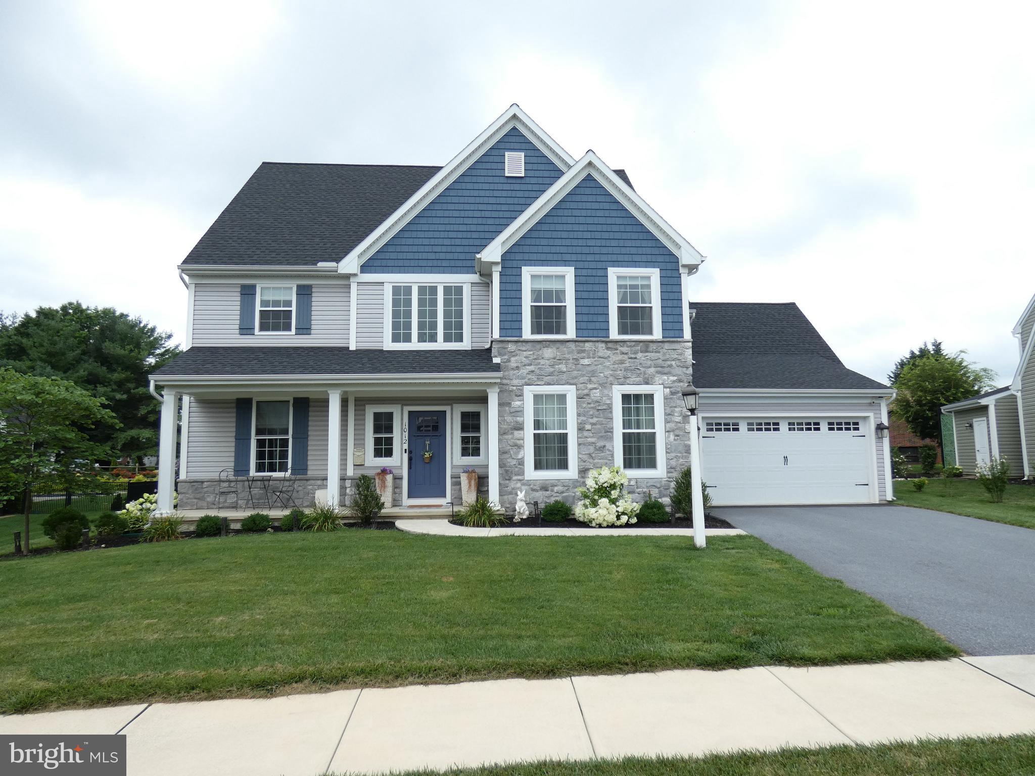Welcome! This is 1012 Whitfield Dr. in the Settlements East subdivision . This custom built Wellington with many upgrades was built in 2021 by Horst & Son, this 2-story home is 2,947 sqft., with 5 bedrooms and 3.5 baths. The oversized 4-car garage has room for your bikes too. This home also has a finished lower level and a covered outside kitchen and patio entertainment area.
Open the front door to a 2-story foyer and beautiful wood staircase that splits the entrances to the study and dining room. And don’t miss the beautiful crown molding and frame wainscotting in the formal dining room. The study is sunny and bright with glass French doors leading to the large window-lined living room. The stunning stone, gas fireplace is topped with a trimmed mantel, and ample shelving for your library. Be sure to notice the rare side wall windows in this room.
Throughout the first floor you’ll find 9 ft ceilings, transom windows, and engineered hard wood flooring. The white Quartz on the kitchen island is dazzling; and hidden behind the kitchen wall is an elegant peg and bench, as well as a walk-in pantry complete with cabinets and a countertop -- the garage access door tucked neatly out of sight.
The owner suite with double door entrance is large and has a sitting area, corner windows, and a walk-in closet with organizers. The full bath with walk-in shower is a dream with its coveted His and Her sink areas and mirrored lights. The 3 other bedrooms are large and sunny as well, with nice closets. The double sinks in the full bath on this floor always being a delight, as well as the convenient, 2nd floor laundry with a wash sink.
The lower level has 1,018 sq ft. of finished living space, and 9 ft. ceilings. There is a 1 bedroom with an egress window, 1 full bath, and the family room also boasts an egress window. Start popping the corn because this family room is wired for a movie projector and surround sound! The 40x8 partially finished storage area has outlets and there is an additional room in the lower level for a 2nd office/study/gift wrapping room.
Built larger, the covered patio entertainment area measures 21.6 x 14 ft. has ceiling fans and retractable screens and sunshades to keep you bug free and cool all summer. And imagine the cheers of your guests at the outside-covered kitchen area (with its own retractable awning and sunshade) while you host your next party. The granite countertops surrounding the refrigerator, with a tap system of course, and both a wood and a gas grill, are the kind of details sure to impress.
This 35 x 24 - 4-car garage is SO oversized, it needed its own paragraph! Equipped with an electrical line for electric vehicle charging, you’ll also love the breezeway that connects the garage to the outdoor kitchen and back patio. Find extra storage here. See documents for Wellington Home upgrades and improvements list. Reserved items.