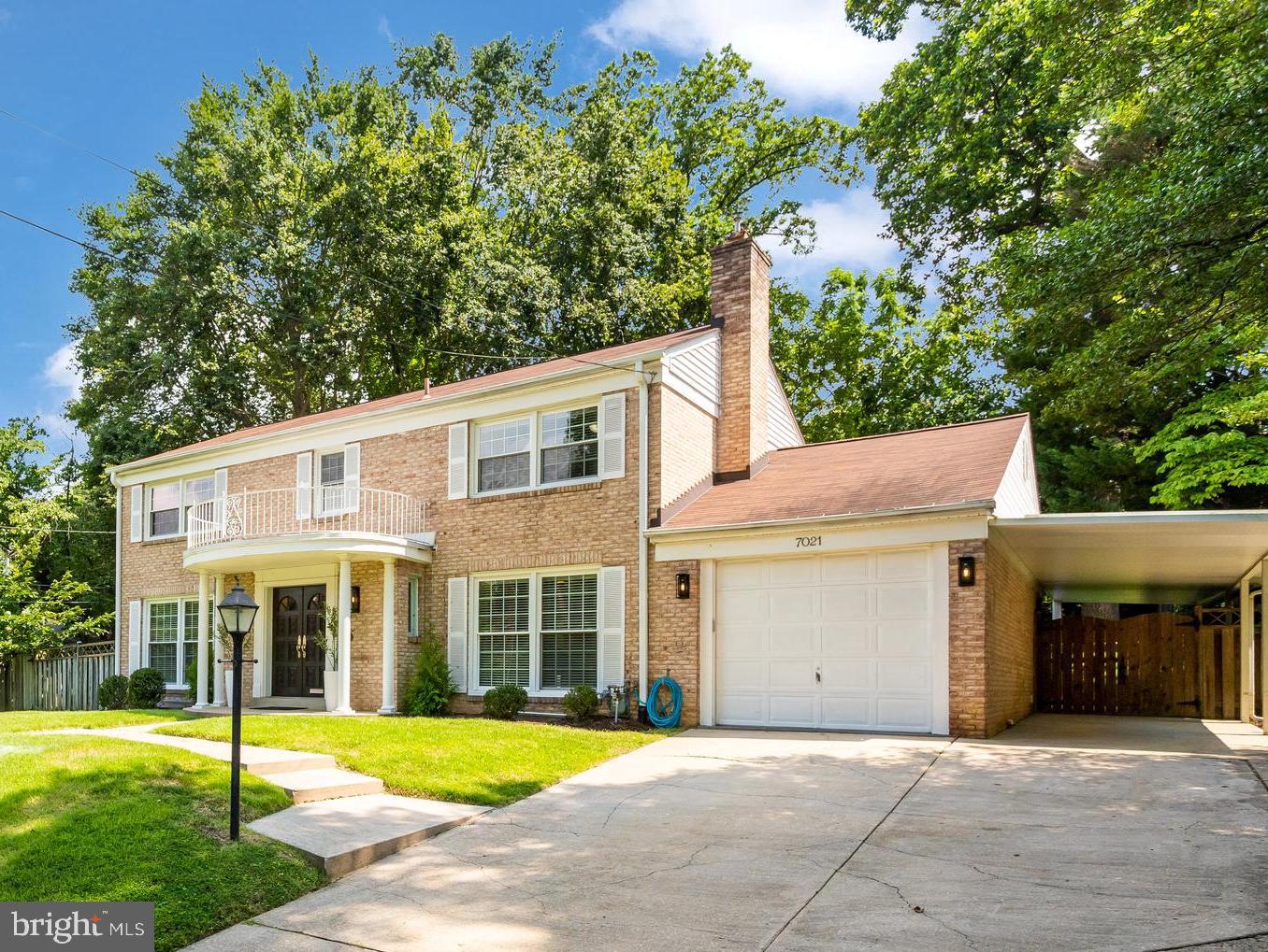 Welcome to this updated and move-in ready classic Colonial home located in the sought-after Kenwood Park neighborhood of Bethesda. This elegant, stately and sun-drenched home offers comfortable and easy living with its 4 bedrooms (3 brs upstairs, 4th br/den in the lower level), 3.5 bathrooms, large gathering spaces, and secluded backyard perfect for outdoor fun.
Step through the carved-wood double entry doors to discover a gracious and welcoming entry foyer, an oversized living room, a freshly updated powder room, an elegant dining room with new lighting and a sliding door to the patio, and a cozy family room with a brick wood burning fireplace. The main floor layout flows perfectly for indoor-to-outdoor entertaining. The updated kitchen features a large island, quartz counters, stainless steel appliances, timeless subway-tiled backsplash, and ample storage. This area will be a favorite gathering spot with its adjoining sunroom/breakfast room that also leads to the back yard. As practical as it is lovely, the kitchen leads to a separate laundry room/mudroom with access to the large one-car garage, making it a perfect drop zone when coming home each day.
The upper level features a large primary suite, offering an enviable walk-in closet and an oversized en suite bath with an extra large separate shower, huge soaking tub, a separate water closet, and double vanities. The secondary bedrooms are also large with great closets and share the updated hall bath. Gleaming oak hardwood floors grace both the main and upper levels.
The lower level features an expansive recreation/family room with new LVP flooring, new windows, recessed lighting, cedar closets, and a basement door to the exterior. The 4th bedroom and the updated 3rd bath round out this level, along with a spacious utility/storage room.
Outside, a large, fully-fenced backyard with a large patio offers a secluded oasis for outdoor activities and al fresco dining. There's plenty of parking with a large one-car garage (with a brand new garage door opener), a carport that runs along the entire side of the house, and parking for 2-3 additional cars.
Ideally located in close-in Bethesda, you'll find yourself only moments away from Bethesda's Downtown with its innumerable dining and shopping venues. Commuting is a breeze with quick access to the Beltway and a fast commute to Downtown DC. Located inbounds to (and a short walk away from) Walt Whitman HS and Pyle Middle School.
Don't miss this special home!