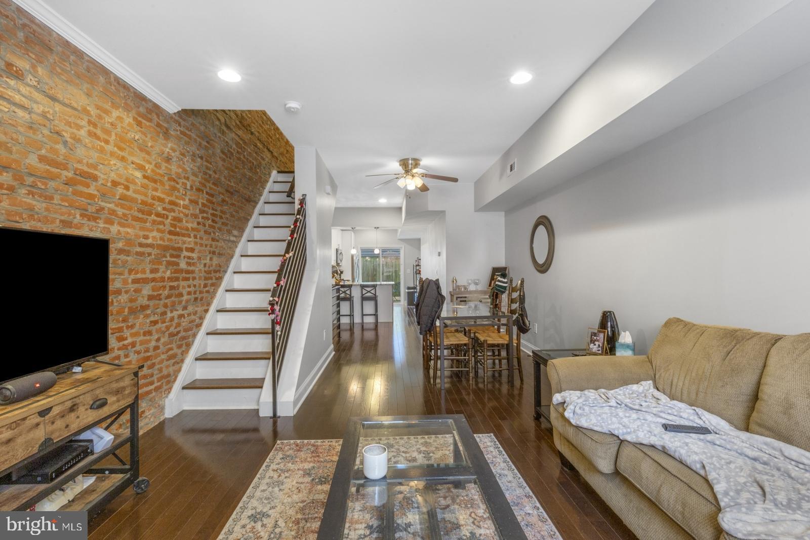 Available Early July:
Welcome to 2442 Kimball St! This beautiful 3 bedroom, 1 bathroom Graduate Hospital home offers a bright and spacious interior with modern accents and finishes throughout, a finished basement, laundry in-unit, and private outdoor space! Enter into the main level with an open floor plan that flows through the living room, dining room, and into the kitchen, ending at sliding glass patio doors that flood the entire space with natural light. There is an exposed brick accent wall, modern metal railing, recessed lighting, and rich espresso wood flooring that all help to elevate the space. The kitchen is separated by a large granite breakfast bar, which completes the L-shaped layout and adds seating for convenience. This space also features cool pendant accent lighting, white shaker cabinets, stainless steel appliances, and a mosaic tile backsplash. Upstairs, you'll find the same brick wall stretching the length of the hallway, a full bathroom, and 3 bedrooms that range in size. The largest bedroom is in the front of the home, and offers a vaulted ceiling, large street facing windows, and a ceiling fan for added comfort. All bedrooms have good closet space, hardwood floors, and great natural light, and could also serve well as home office or creative space. There is also a fully finished basement with tile flooring, recessed lighting, windows for sunlight, storage space, and a separate area with your front-loading washer and dryer. This fantastic space won't last long - schedule your tour today!
Please note that the following items are included with the property: patio table; kitchen stools; dehumidifier.
Lease Terms:
Generally, 1st month, 12th month, and 1 month security deposit due at, or prior to, lease signing. Other terms may be required by Landlord. $55 application fee per applicant. Pets are conditional on owner's approval and may require an additional fee, if accepted. (Generally, $500/dog and $250/cat). Tenants responsible for: electricity, gas, cable/internet, and water. Landlord Requirements: Applicants to make 3x the monthly rent in verifiable net income, credit history to be considered (i.e. no active collections), no evictions within the past 4 years, and must have a verifiable rental history with on-time rental payments. Exceptions to this criteria may exist under the law and will be considered. Cosigners accepted.
