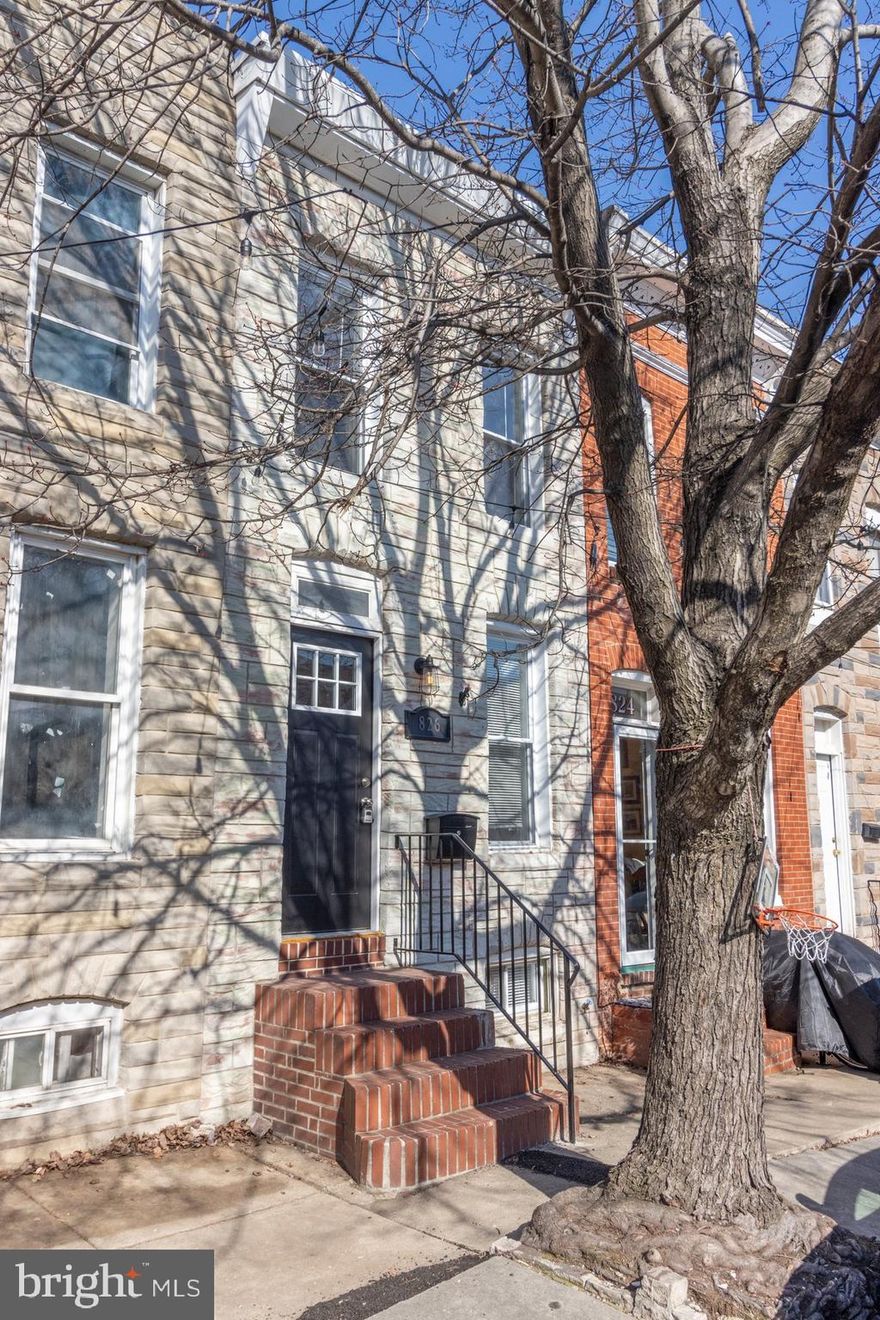 Situated on a quiet, tree-lined street with ample parking. This beautifully renovated (from top to bottom) home features 3 fully finished levels with over 1,400 sqft living space,  an updated kitchen with stunning granite countertops, white soft-close cabinets, and new appliances. The main level has an open layout with tons of natural light and also includes a powder room. The back door will take you to a large deck that is perfect for entertaining. The upper level has 2 bedrooms and 2 full bathrooms, including a master ensuite with a walk-in shower that is surrounded by beautiful tile. The lower level is fully finished with a 3rd full bathroom, a large family room (that could be used as another master or 3rd bedroom), storage, and a laundry room. This home is move-in ready! Close to M&T Bank Stadium, Camden Yards, restaurants, shopping, and the Inner Harbor! This is a MUST-SEE!