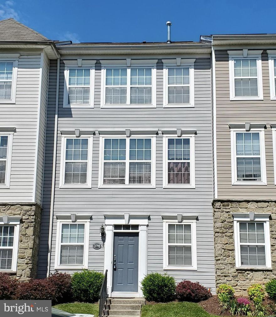 Welcome to this well-maintained 3-level townhome in the highly sought-after Parkside at Ashburn, a gated community in Loudoun County. This spacious 2-bedroom, 2-full-bath home features a 2-car garage, neo-traditional architecture, and offers a smart, flexible layout ready for your personal touch. The freshly painted main living level boasts a large, inviting family room with a cozy fireplace, a bright dining area, and an open-concept kitchen with center island perfect for daily living and entertaining.  Step out from the kitchen to your private deck, ideal for relaxing or entertaining. The lower-level entry offers a bonus space, perfect for a home office, study or recreation room. While the home has not been recently updated, it presents an exciting opportunity for customization to fit your taste and lifestyle. Residents enjoy resort-style amenities: Gated access, Lawn Care Maintenance Included, Clubhouse and party room, Outdoor swimming pool, 24-hour fitness center, Basketball court, Patio with barbecue grill, and Tot lots and walking trails. Ideally positioned off Waxpool Road, between Broadlands and Ashburn Village, with easy access to the Silver Line Metro, Dulles Greenway, Routes 7 and 28, and Dulles Airport. Just minutes from shopping, dining, grocery stores, and entertainment at One Loudoun and other nearby centers. Don’t miss this chance to own in one of Ashburn’s most convenient and amenity-rich communities—ready for your vision and upgrades!