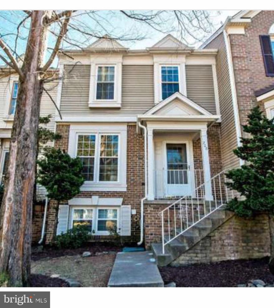 Back on the market!!!3 finished level town home in great location. Hardwoods throughout main floor. Kitchen opens to airy eat-in area and deck. The wood burning fireplace in basement. Cathedral ceiling in master suite, skylight in adjoining master bath Lots of storage! Property is occupied. Do not miss this opportunity! As is condition. Fabulous investment.