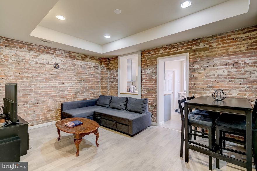 2 bed 2 bath flat located in the heart of Pigtown / Washington Village steps away from M&T Bank Stadium, Camden Yards, the Inner Harbor, and central to public transportation, Metro, 95, and the other major subdivisions like Federal Hill, Locust Point, Canton, Fells Point, etc. This unit features  a kitchen, living room and 2 Bedroom, walk in closet, exposed brick, and 2 full baths all on the same level.