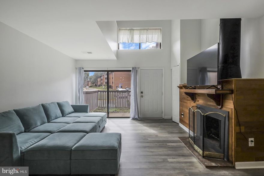 Step into your dream home! This condo is a total stunner, with a fresh, modern makeover. It's has an upgraded kitchen, and newer appliances. The main floor has a big living area,  kitchen with bar top serving area, and a cozy fireplace that adds so much character. The main level has a half bath for guests.  Upstairs there's one spacious bedroom with two closets and 1 full bathroom.
Living here means you get access to awesome amenities and services - trash pickup, snow removal, water - it's all covered in the condo fee.  Less than 3 miles to Costco, Walmart, and Mt. Vernon Hospital.  Less than 10 miles from Huntington Metro Station, Ft. Belvoir, Old Town Alexandria, Wegmans, and I-495.  Don't miss your opportunity to own this unique condo!