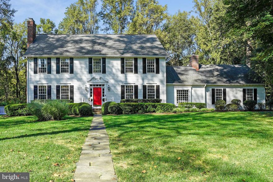 Impeccably maintained Williamsburg Colonial with loads of upgrades nestled on a level, private treed lot.  Over 5000 finished sq feet. New HardiePlank siding in 2022,  freshly painted, and beautiful newly refinished hardwood floors  on the main & upper levels! (FULL list of updates/improvements in Document section) Amazing French country kitchen with coffered ceilings, Wolf range, large center walnut island, Soapstone countertops, built in wine refrigerator and TWO  dishwashers!  Kitchen with space for large table as well as a cozy breakfast nook area overlooking serene backyard with french doors to huge deck!  Family room off kitchen with a wood burning stone FP, perfect for cozy evenings.  Private main level office with built ins. Living room with  FP and oversized formal dining room made for entertaining! Hardwood staircase leads to 4 BRs and 3 Baths on the upper level. Spacious primary suite with FP,  hardwood floors and walk in closet. Upgraded primary bathroom with slate floors, marble shower, separate jetted soaking tub, and dual vanity. Bedroom 2 with en suite upgraded full bathroom perfect for guests. Bedrooms 3 & 4  share a beautifully renovated Jack & Jill bath. Main level laundry and a bonus lower level washer and dryer in fully finished  lower level with a possible 5th  BR/den/study and a fully renovated bathroom with roll in shower. Fireplace #4  in recreation room plus so much space for play and workout areas! Walk up stairs. Rear yard with fun sport court and play area. Electric fence as well. Langley pyramid!