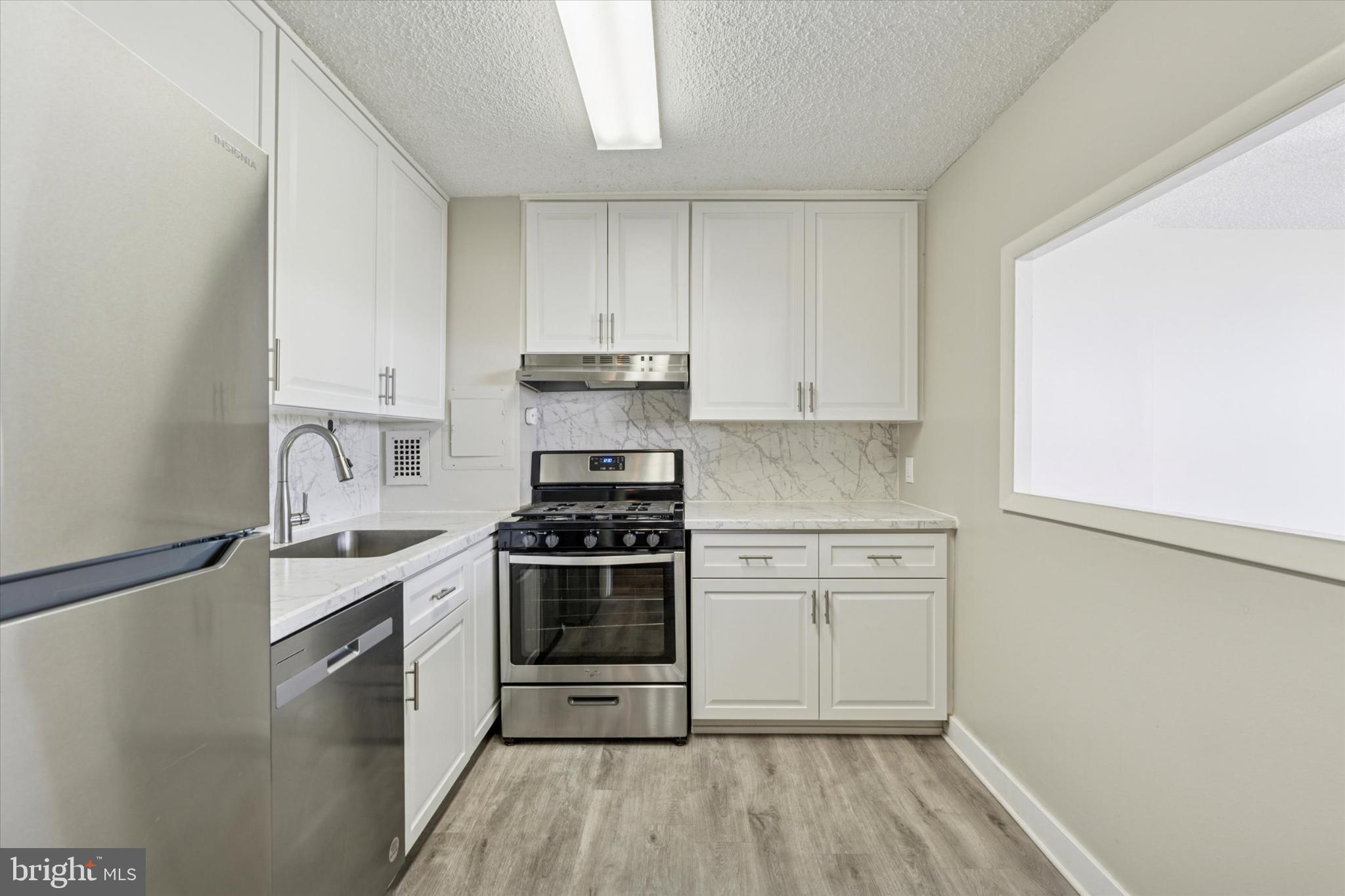 Welcome to Unit #521 in the highly sought-after Radnor House community—just minutes from Villanova and everything the Main Line has to offer! This beautifully updated 2-bedroom, 1-bathroom condo is perched on the 5th floor and offers a perfect blend of style and convenience. The kitchen features stainless steel appliances, gas cooking, and modern white shaker cabinetry. A pass-through window opens to the living room, making it easy to stay connected with guests or family while cooking. The refreshed bathroom and neutral paint throughout add to the clean, contemporary feel of the space. Radnor House amenities include 24-hour security, on-site management, three elevators, an outdoor pool, BBQ terrace, playground, extra storage space, and laundry facilities. There is plenty of free parking and garage parking is available for an additional fee. Located in the award-winning Radnor Township School District and just a short walk to the Rosemont Train Station and Septa Garrett Hill Stop, this condo offers easy access to center city, nearby shops, restaurants and parks. Don’t miss your chance to live in one of the Main Line’s most convenient and desirable communities—schedule your showing today!