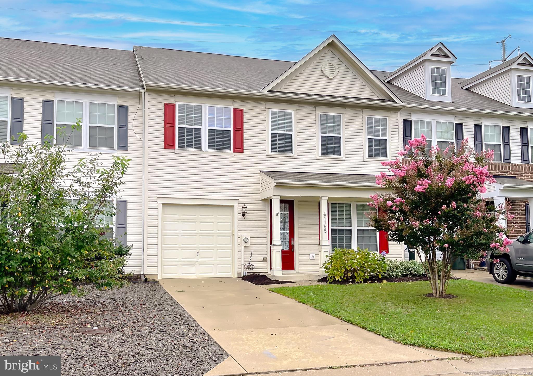 RARE FIND! Desirable 30-foot wide townhome in Woodland Park. You'll love the spacious feel of this gorgeous 2,000+ sq ft home. Updated with LVP flooring, this 3-bdrm, 2.5 ba beauty features granite counters, attractive Maple cabinets, built-in shelving, walk-in closets in every bedroom, and a backyard that backs to trees! The open-concept layout makes entertaining a breeze, and you have your choice of formal dining, a meal in the dining nook, or a quick snack at the island breakfast bar. A pantry closet, new dishwasher & disposal, tile backsplash, and recessed lighting are other kitchen highlights. The living room is wired for surround sound and features built-in shelving for your library or collectibles. You'll find three big bedrooms upstairs, and the primary includes two walk-in closets, and bath w/ double vanities, soaking tub and walk-in shower. A 5-yr-young water heater, upstairs laundry room, and 1-car garage add to the appeal. A lovely park & playground is just blocks away, and you can walk to the Wildewood community pool, clubhouse and recreation area. This great location is minutes away from main commuter routes, shopping and restaurants. Don't miss your opportunity at this rare find, request your showing today!