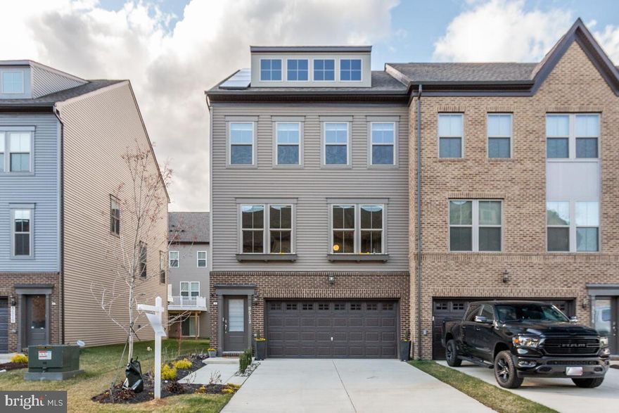 AVAILABLE FOR NOV. 15th MOVE-IN! 
Timeless elegance meets modern convenience in this stylish Capital Court end-unit townhome you're sure to appreciate! Inside, neutral color tones complement the hardwood flooring cascading across the main and the lower levels. Mingle with guests as your favorite tunes play through surround-sound speakers in the open-concept gathering areas. Catch up in the contemporary living room before leading the party to the sunlit dining area with an adjacent bar. Steps away, the gourmet kitchen treats you to a suite of appliances, including convection and wall ovens, as well as a multi-seater island under pendant lighting.

Relax in the four well-sized bedrooms and 3.5 baths with a primary retreat showcasing two walk-in closets. Discover ideal outdoor entertaining and unwinding spaces, including an oversized deck and a fenced-in backyard with low-maintenance artificial turf and patio. Convenience is yours with an attached 2-car garage plus innovative features like automated blinds, a keyless entry, and a smart integrated thermostat. This home is equipped with solar panels to allow a lower electric bill. Enjoy living less than a mile from the metro, easy access to major beltways, a quick drive into the city and plenty of shopping nearby. Take a tour of this must-have abode today!

*hot tub and fireplace are exclusions