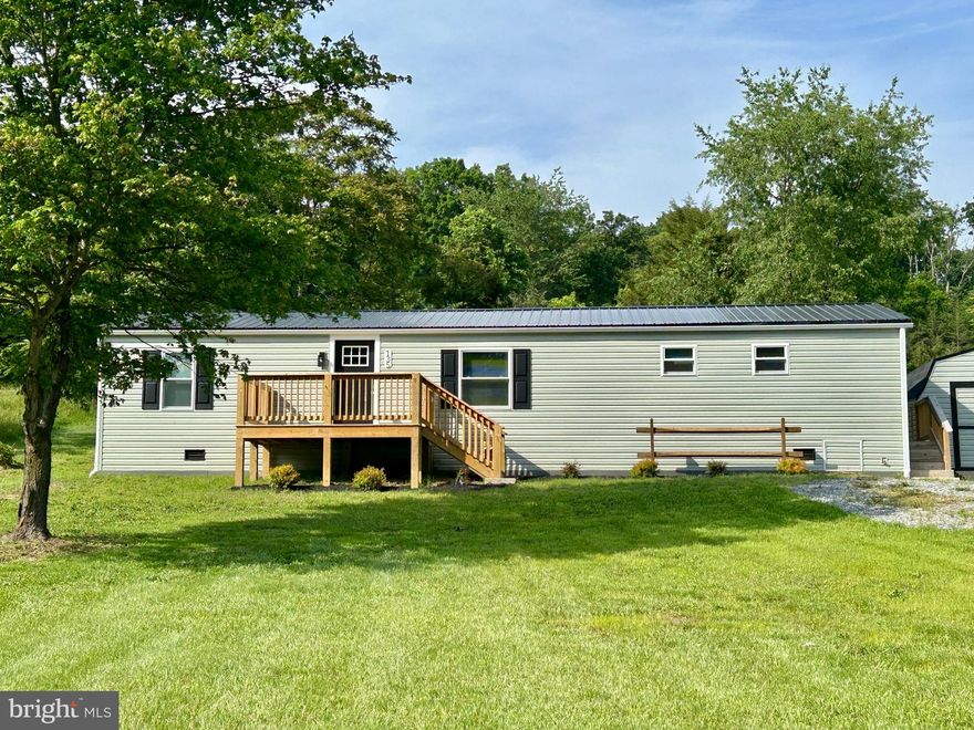 Nestled just a stones throw from the banks of the Potomac River!  Don't let the common exterior fool you because once inside, this home explodes with character.  This beautifully renovated manufactured home offers the perfect blend of modern comfort and peaceful living.  Home has just over 4/10 of an acre, and features 3 bedrooms and 2 full baths all contained within its 1440 square feet of thoughtfully designed living space.  Completely renovated in 2025, this home shines with contemporary finishes and upgraded infrastructure including new plumbing, electrical, heating/cooling system, new metal roof, new windows and vinyl siding. Step inside to find tasteful vinyl plank flooring flowing seamlessly throughout the spacious open-concept layout.  The kitchen is chef's dream equipped with sleek stainless steel appliances, ample cabinetry and plenty of counterspace for meal prep or entertaining. Each of the three bedrooms offers generous space and natural light while both bathrooms have stylish fixtures and modern finishes. Outdoor living is just as inviting with newly added front deck - ideal for relaxing. The crawl space has new vapor barrier for added durability and water protection.  Come take a look for yourself, and you will be glad that you did.  Won't last long at this price, so make your appointment to tour today!