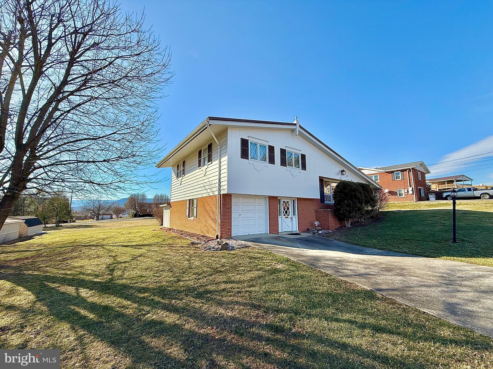 Back on the Market Due to No Fault of the Seller!!!
This stunning home, meticulously maintained, offers four spacious levels of living space, perfect for a variety of needs. Upper Level: Three large cozy bedrooms and a full bath. Mid-Level: Open and inviting kitchen and dining area. Large, bright living room, ideal for relaxation and entertaining. Entry Level: A den with a wood-burning fireplace insert—perfect for chilly winter nights. A welcoming foyer and convenient garage access. Basement: Entertainment room with wet bar, perfect for hosting gatherings. Unfinished area with a second full bath, offering potential for customization. Access to the backyard. Recent Upgrades: Recently serviced oil furnace, Central heating and cooling unit, Brand-new metal roof and New range in the kitchen. Additionally, the property includes ownership of 2/3 of the neighboring parcel, offering ample space and privacy.
Located in a quiet neighborhood, this home boasts breathtaking small-town views, a large lot, and is close to all the conveniences of town. This home is move-in ready, so don’t miss out on the opportunity!
Call us today for your private showing!